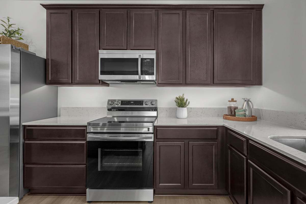Plan 1860 Modeled - Recessed-panel birch cabinets and under-cabinet lighting