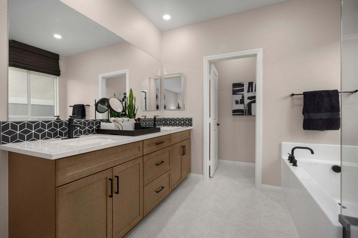 Plan 2026 Modeled - Optional extended vanity with drawer bank at primary bath