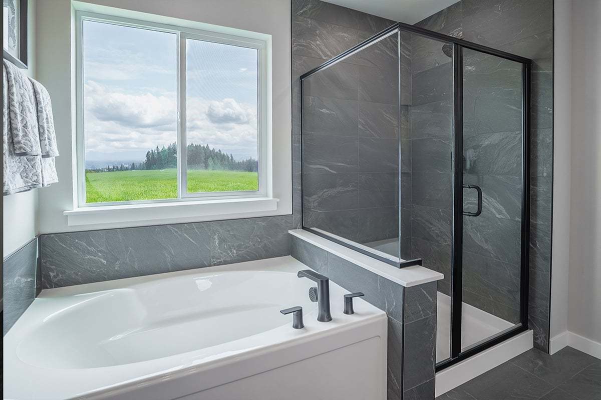 Plan 2565 Modeled - Tub and separate shower at primary bath