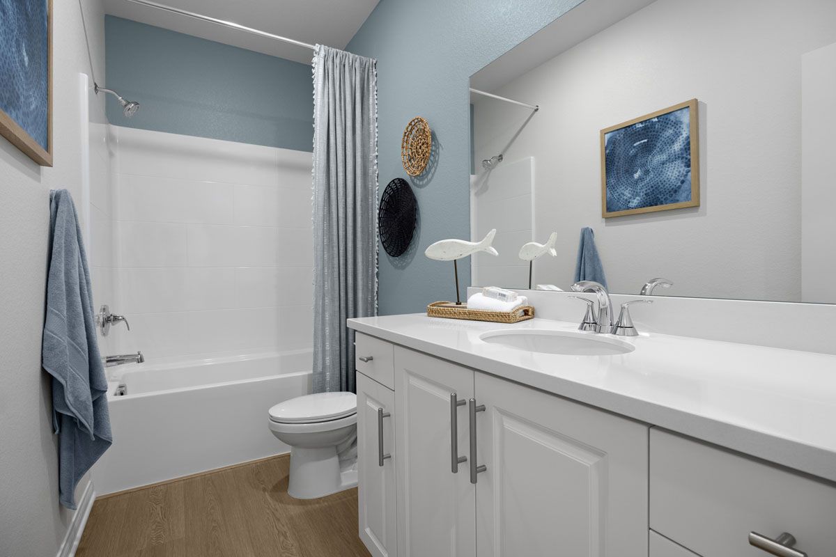 Plan 1882 Modeled - Engineered stone countertops at full baths