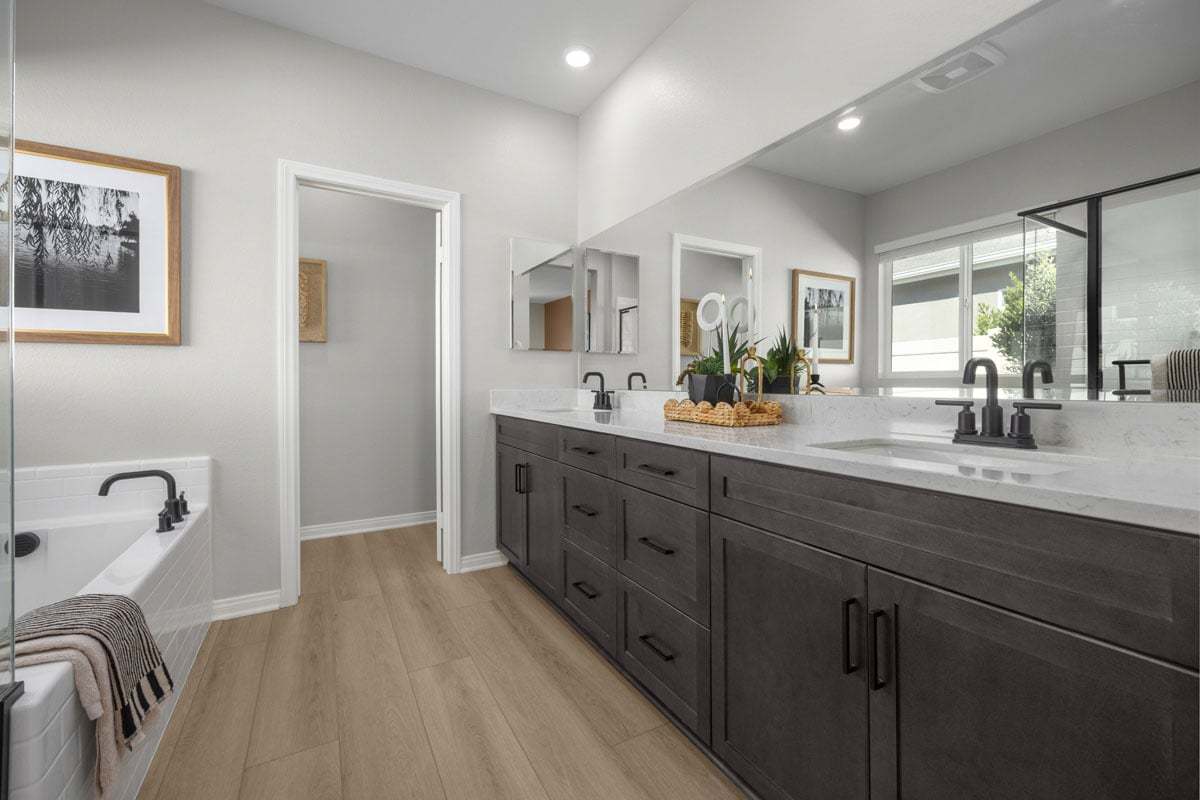 Plan 2026 Modeled - Optional extended vanity with drawer bank at primary bath