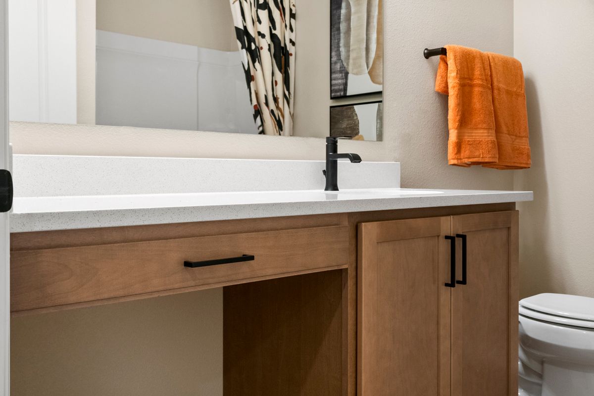 Plan 1989 Modeled - Extended vanity with knee space at secondary bath
