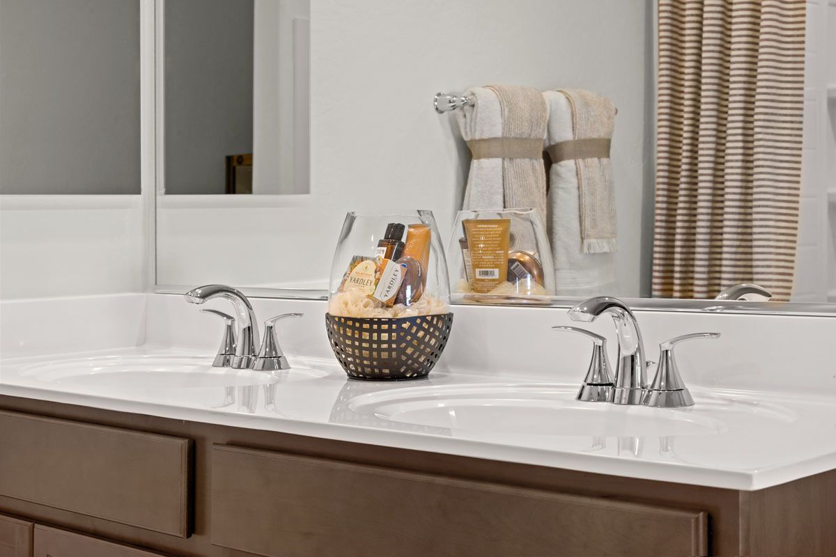 Plan 1718 Modeled - Dual-sink vanity at primary bath