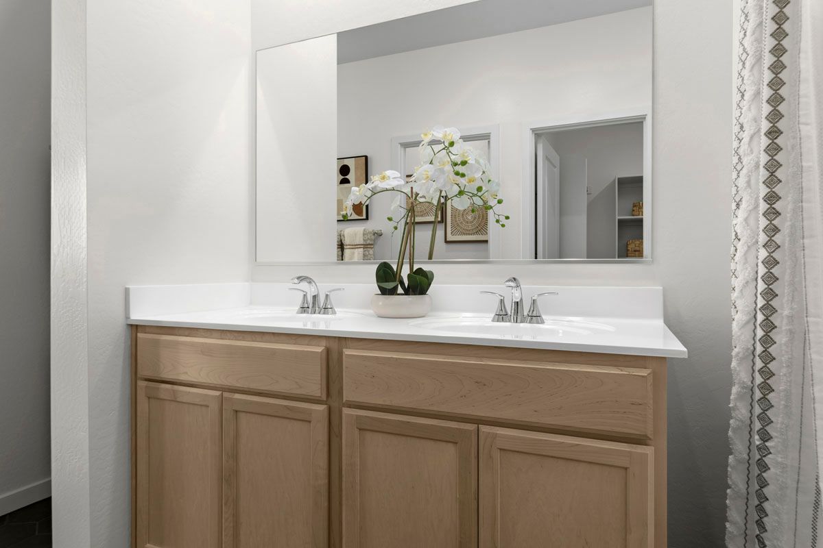 Plan 1439 Modeled - Dual-sink vanity at primary bath