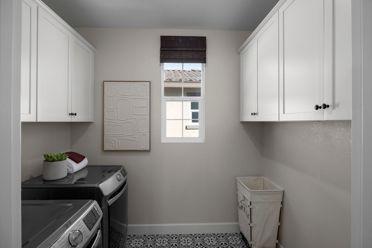 Plan 2539 Modeled - Second floor laundry room with storage