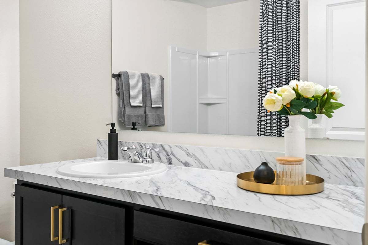 Plan 1989 Modeled - Laminate countertops at secondary bath