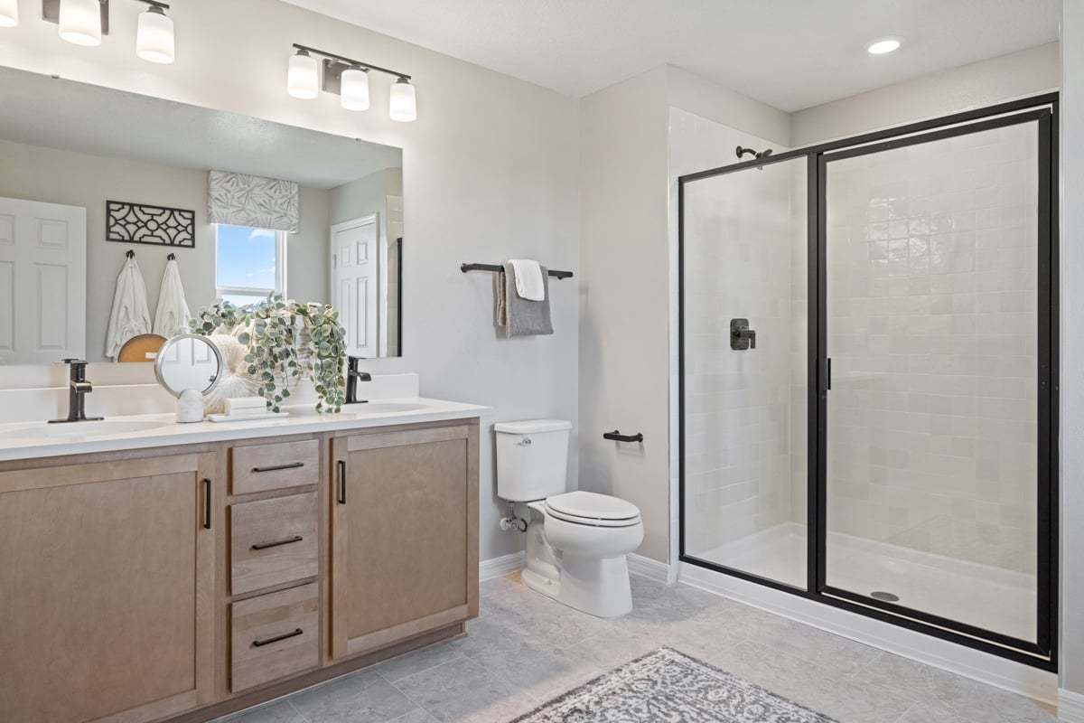 Plan 2566 Modeled - Walk-in shower at primary bath