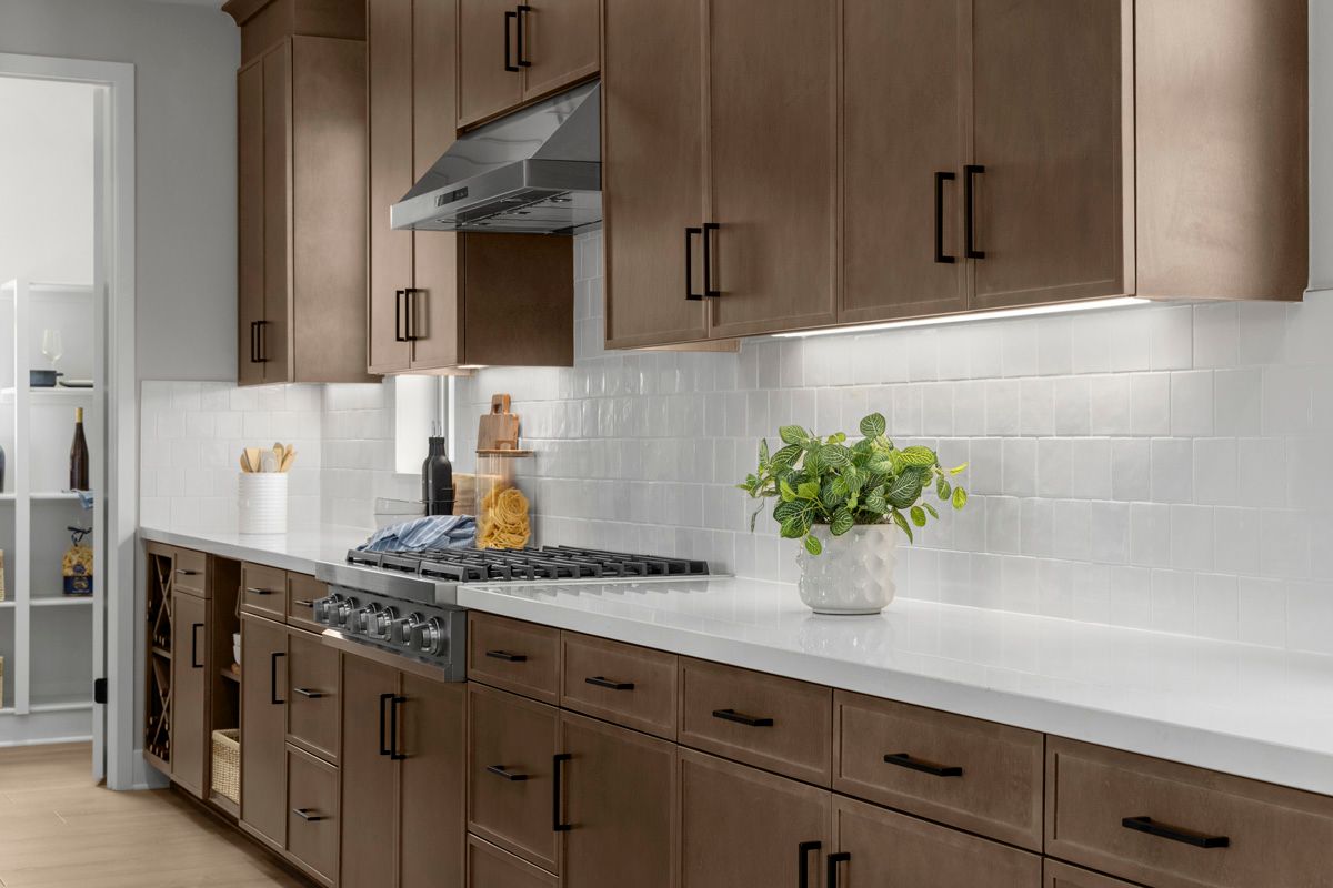 Plan 2638 Modeled - Optional upgraded quartz countertops and tile backsplash