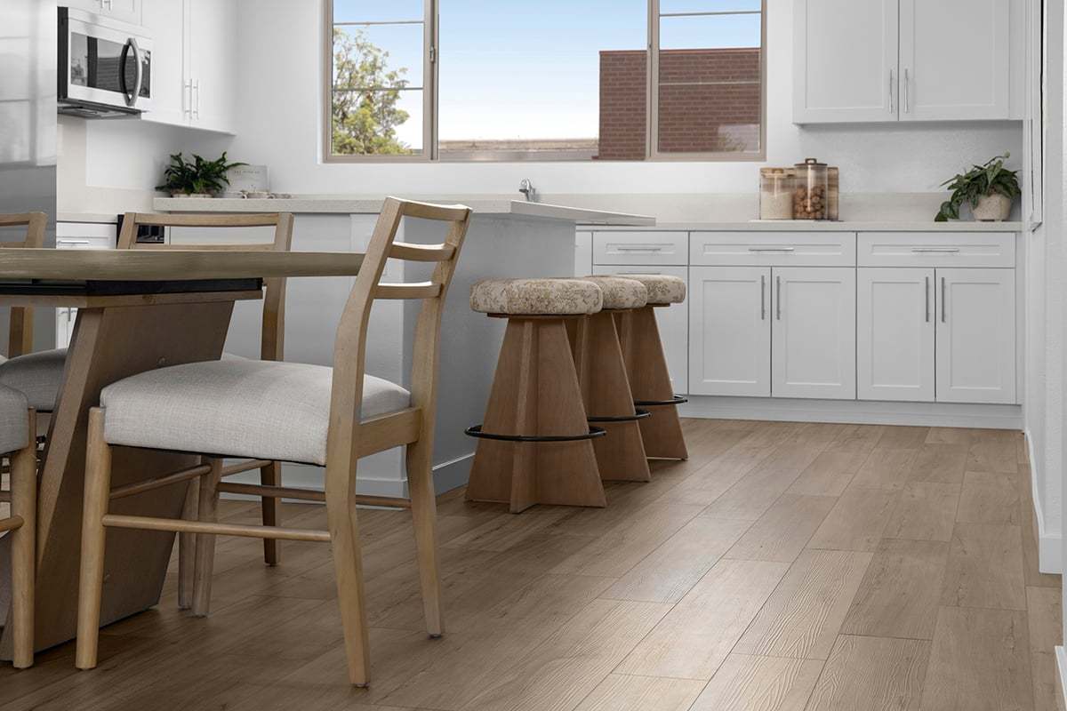 Plan 1529 Modeled - Luxury vinyl plank flooring at kitchen
