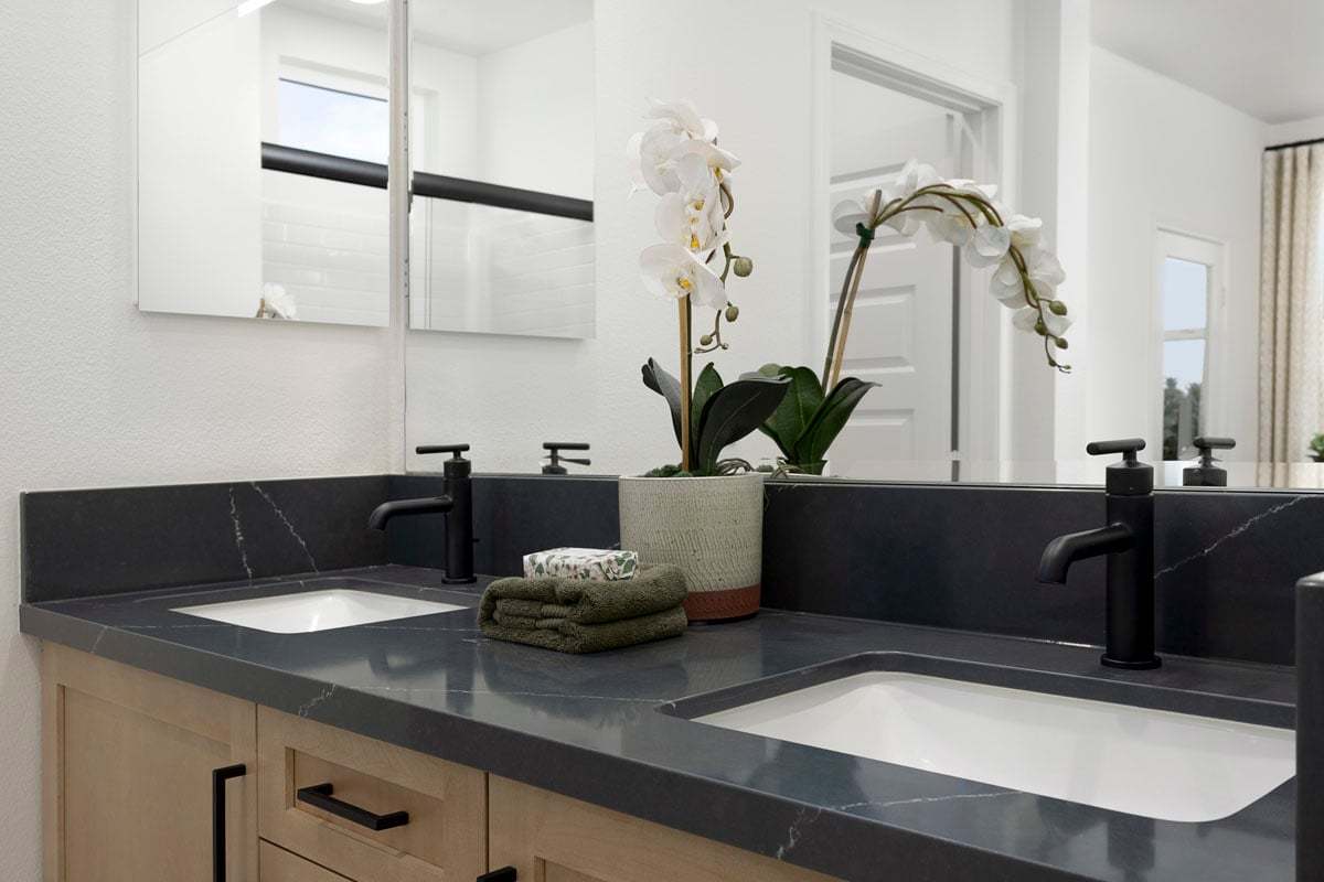 Plan 1630 Modeled - Optional quartz countertop and undermount sinks at primary bath