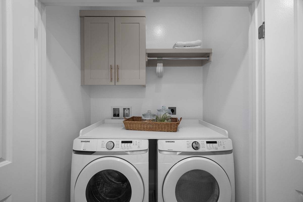 Plan 1718 Modeled - Optional laundry upper cabinets, shelf and pole