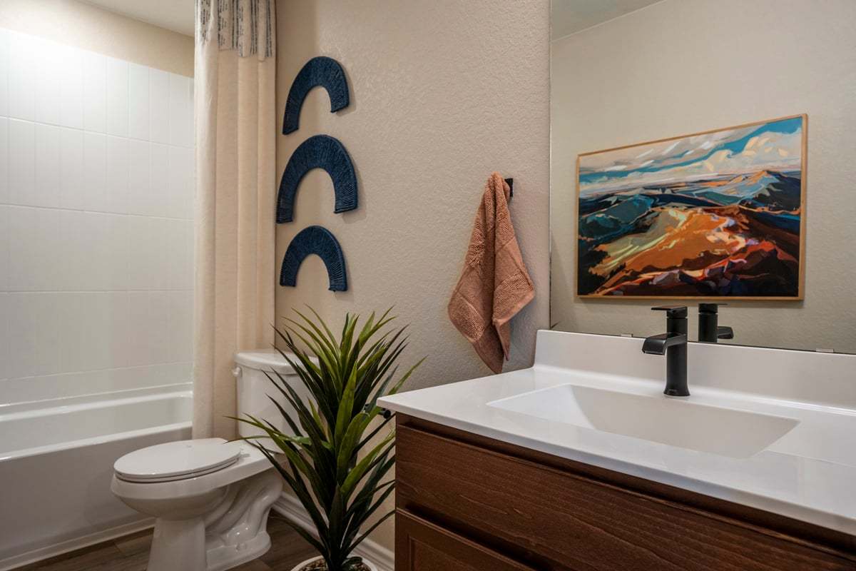 Plan 1389 Modeled - Bath/shower combination at secondary bath