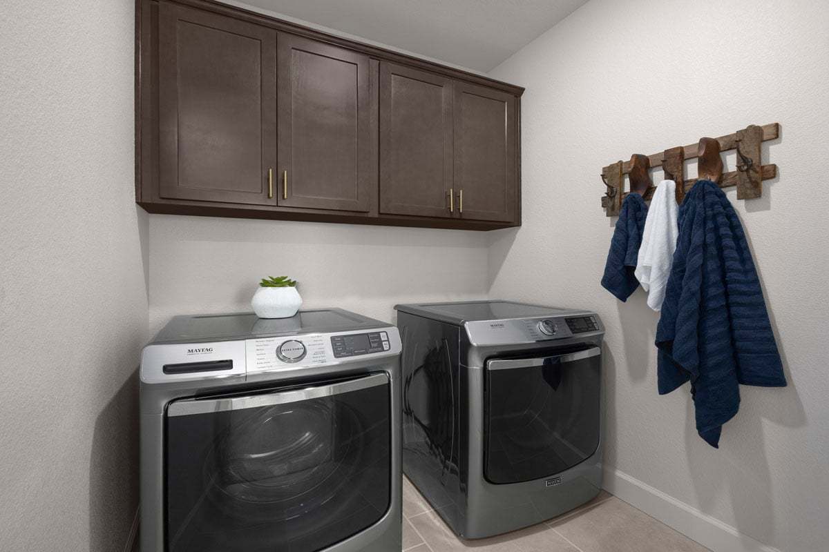 Plan 2422 Modeled - Dedicated laundry room with upper cabinets