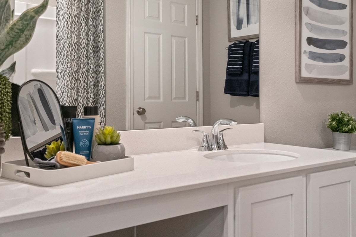 Plan 1707 Modeled - Extended vanity with knee space at bath 2