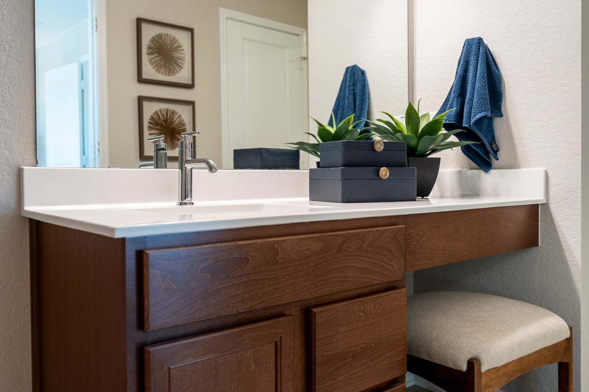 Plan 1676 Modeled - Extended vanity with knee space at bath 2