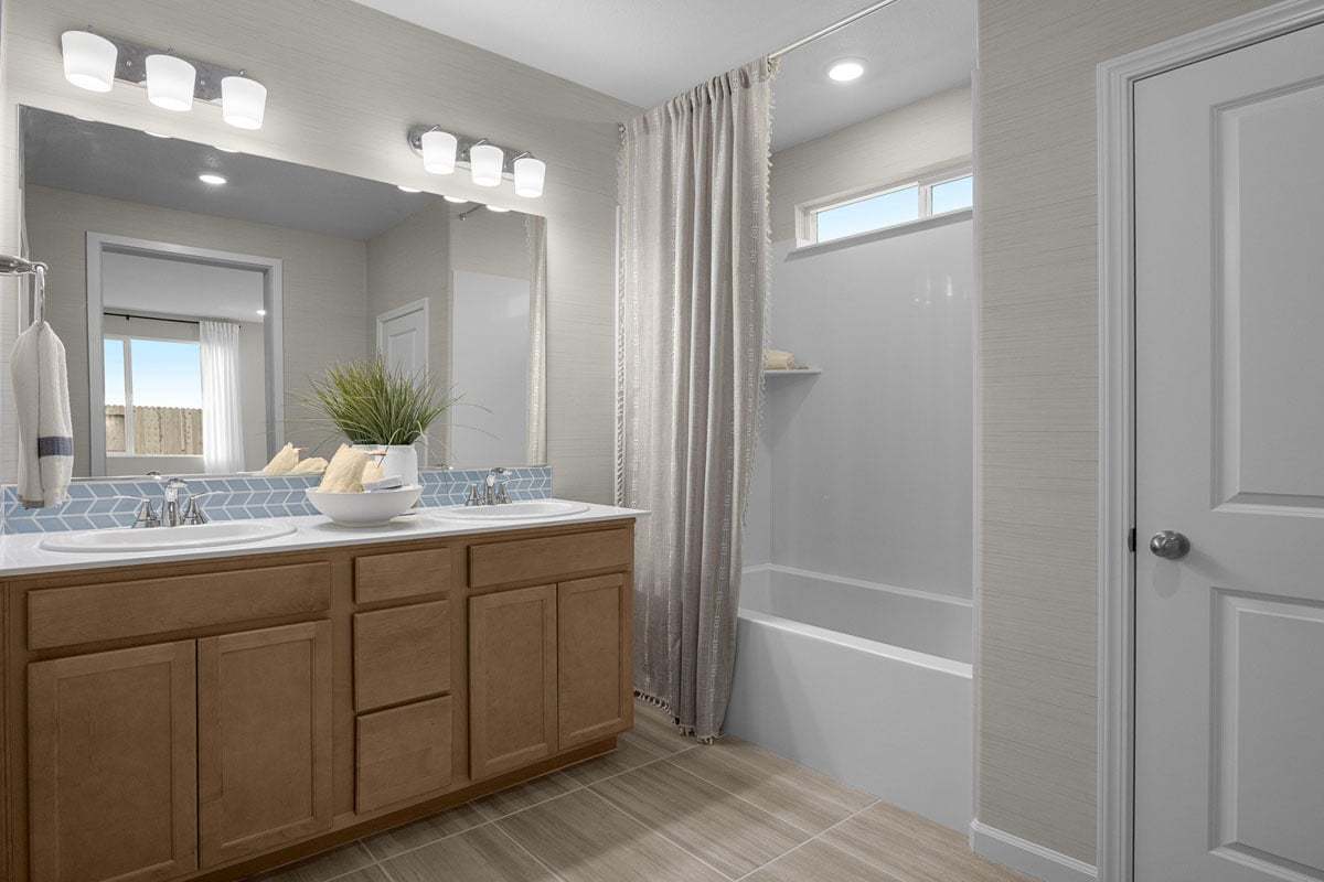 Plan 1718 Modeled - Dual-sink vanity at primary bath