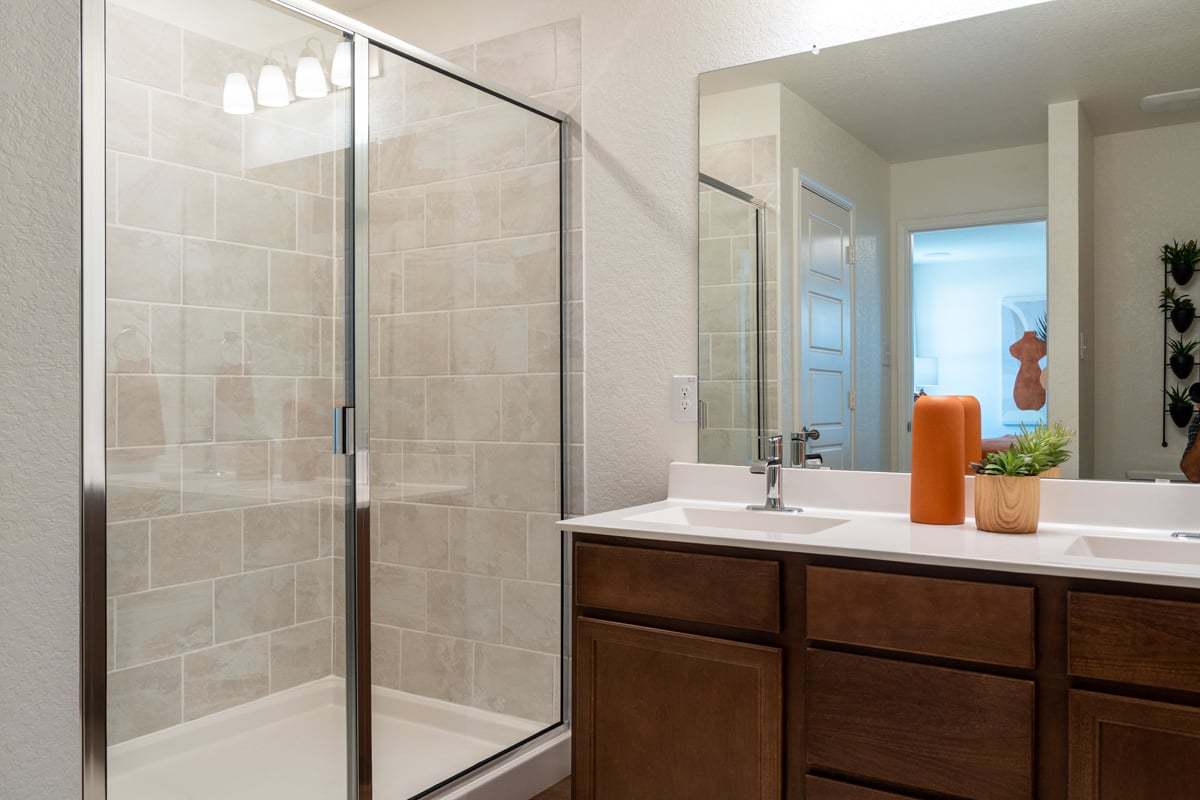 Plan 1663 Modeled - Shower with tile surround at primary bath