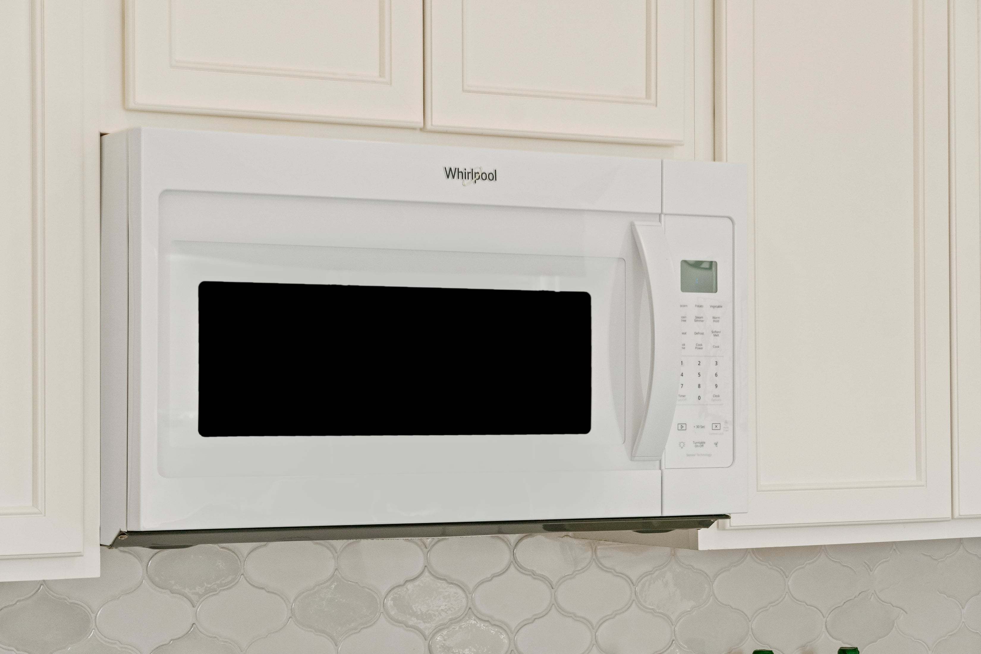 Plan 1242 - Microwave/hood combination at kitchen
