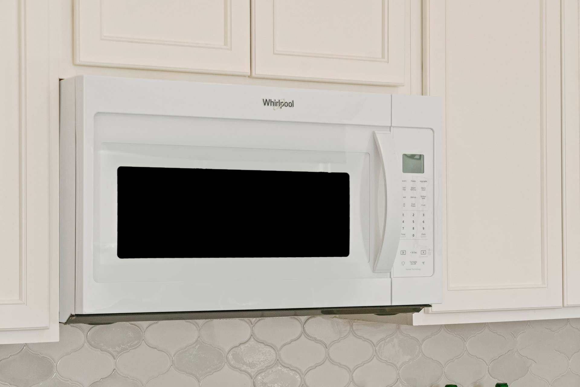 Plan 1242 - Microwave/hood combination at kitchen