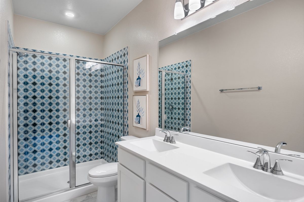 Plan 1242 Modeled - Dual-sink vanity at primary bath