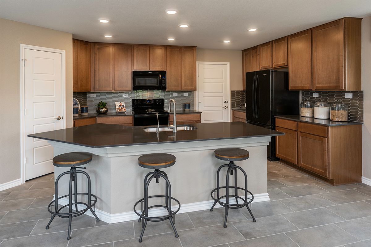 Plan 2411 - Plan 2411 Kitchen as modeled at Champions Landing