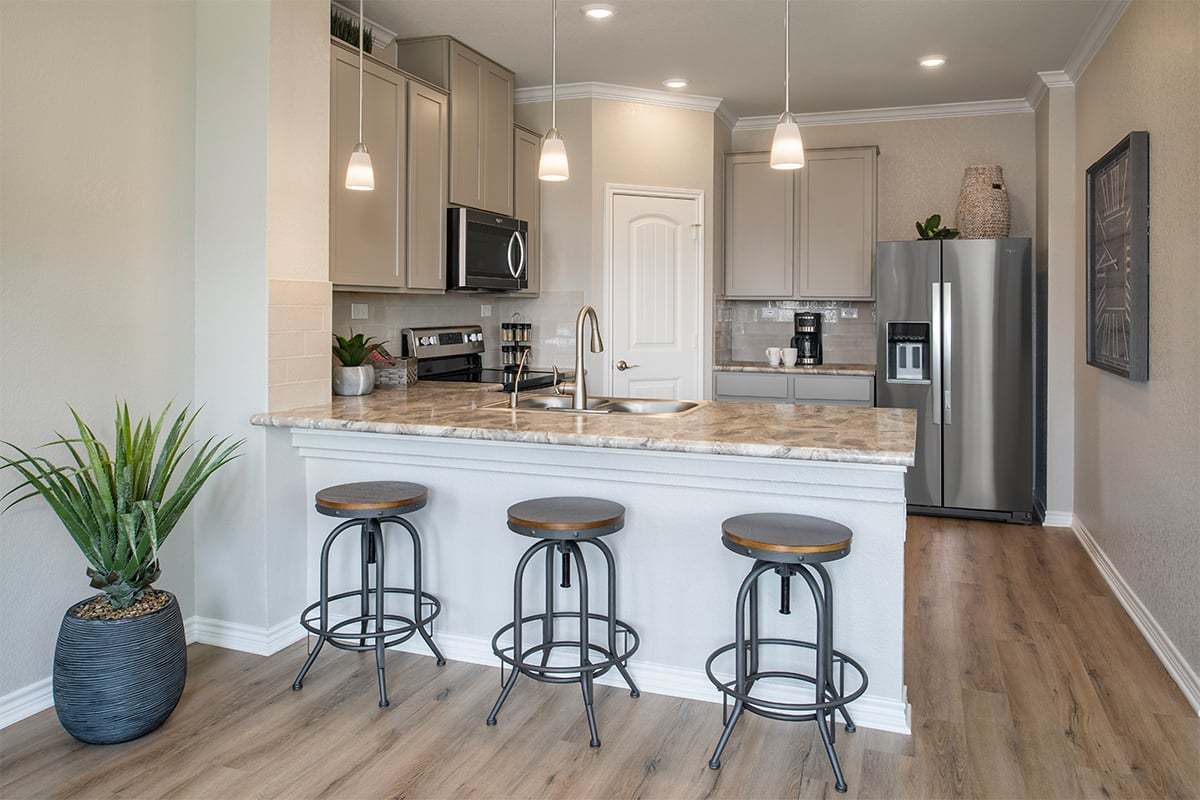 Plan 1780 - Plan 1780 Kitchen as modeled at The Overlook at Medio Creek