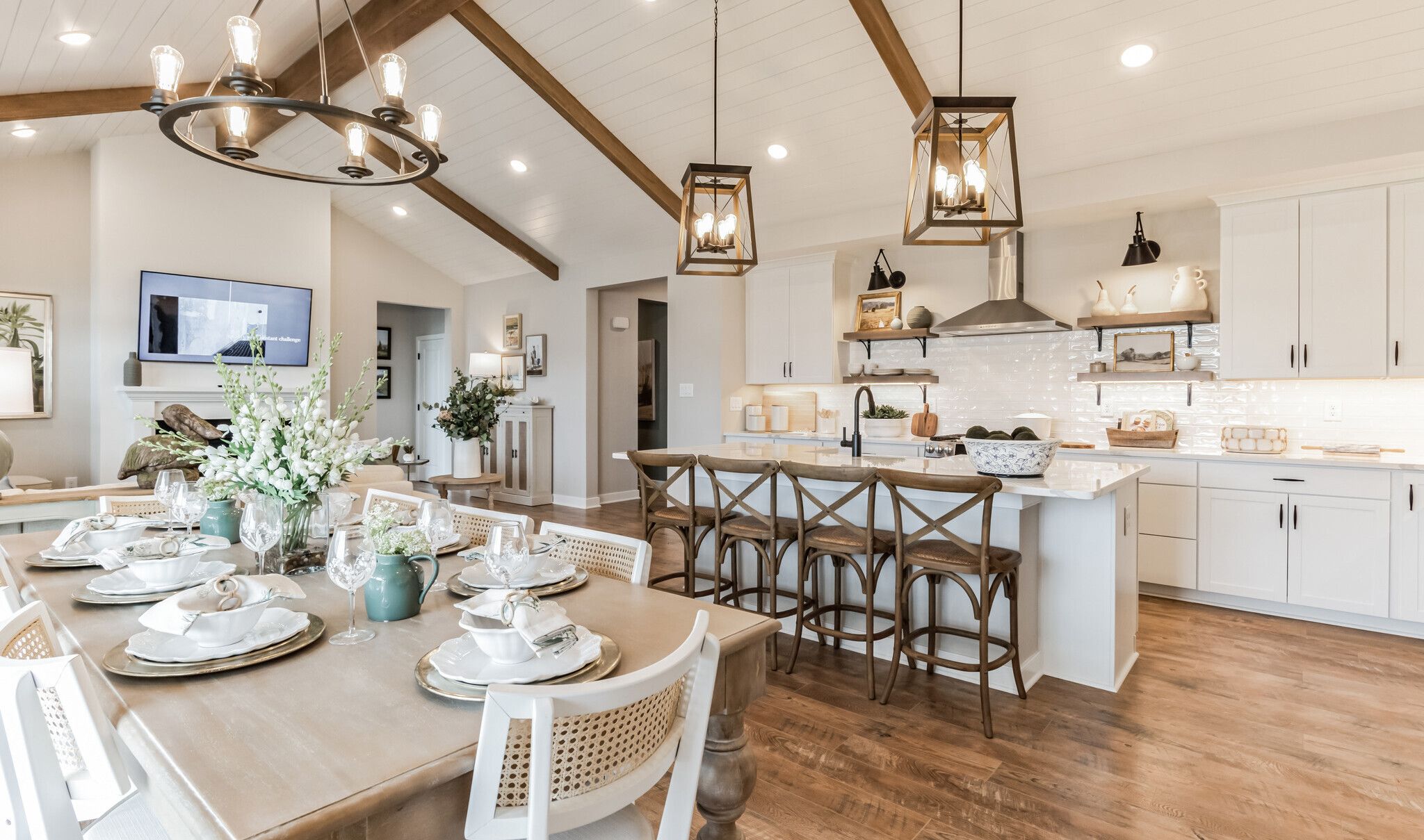 Kitchen with pendant lighting, vaulted ceiling and stained ceiling beams