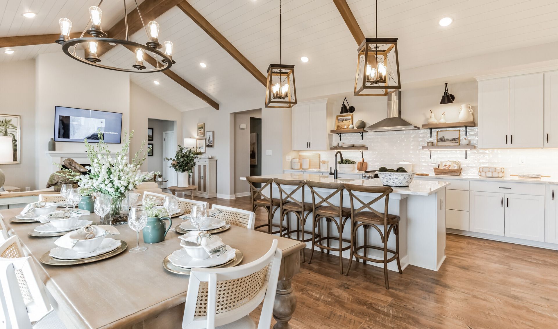 Kitchen with pendant lighting, vaulted ceiling and stained ceiling beams