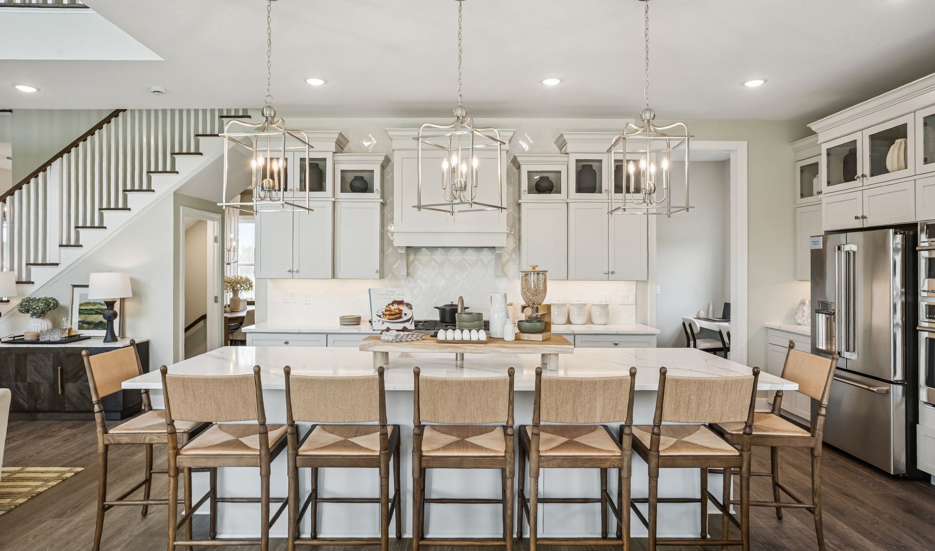 Kitchen with center island and white cabinets