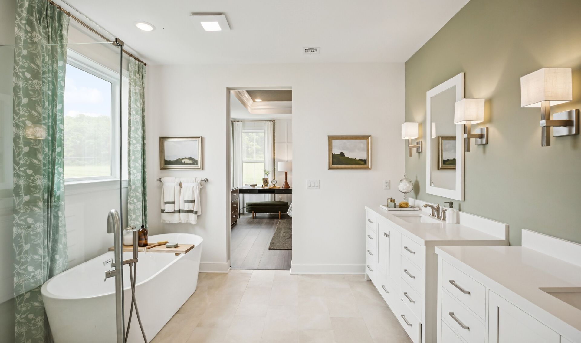 Primary bath with glass shower enclosure and freestanding tub