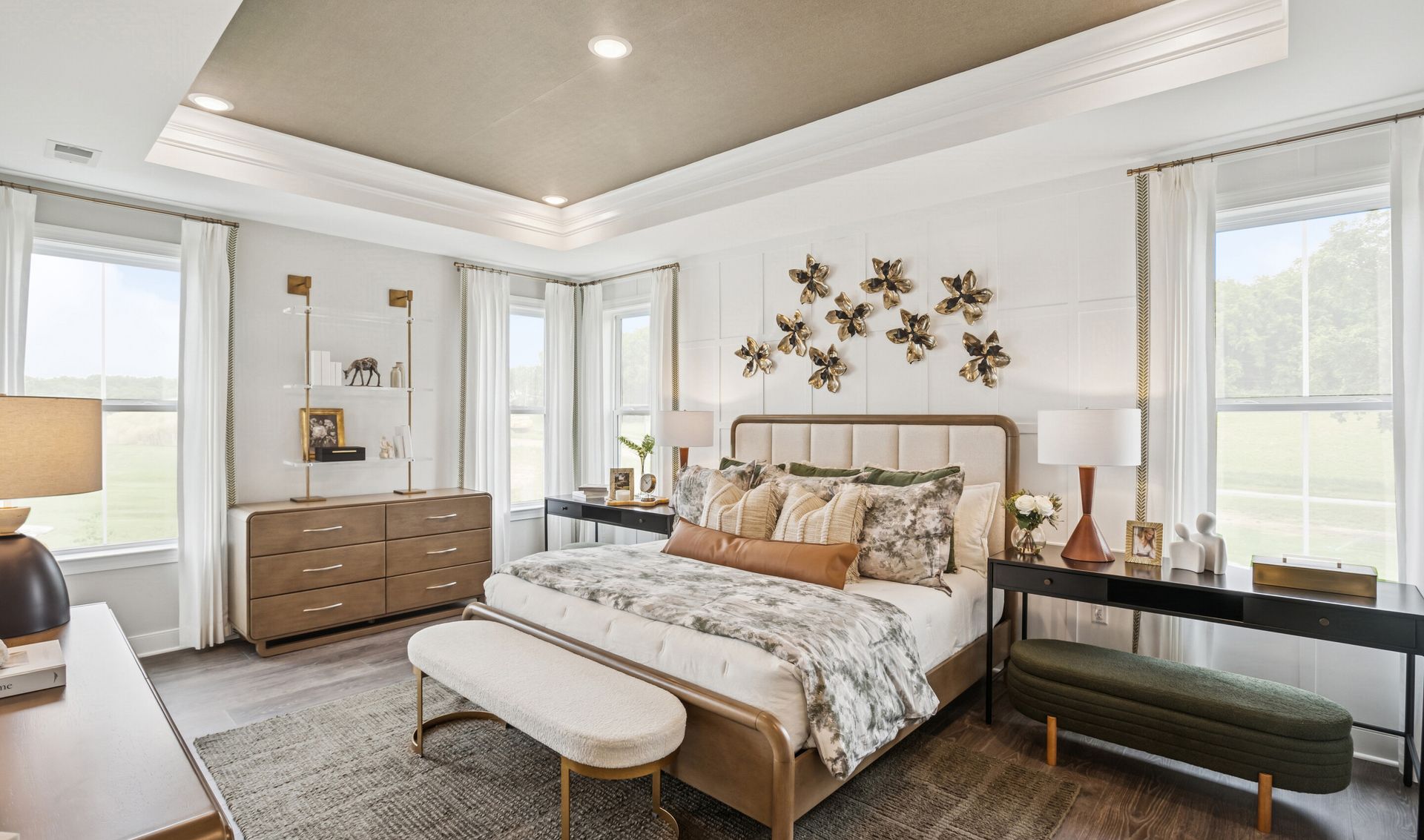 Primary suite with decorative feature wall