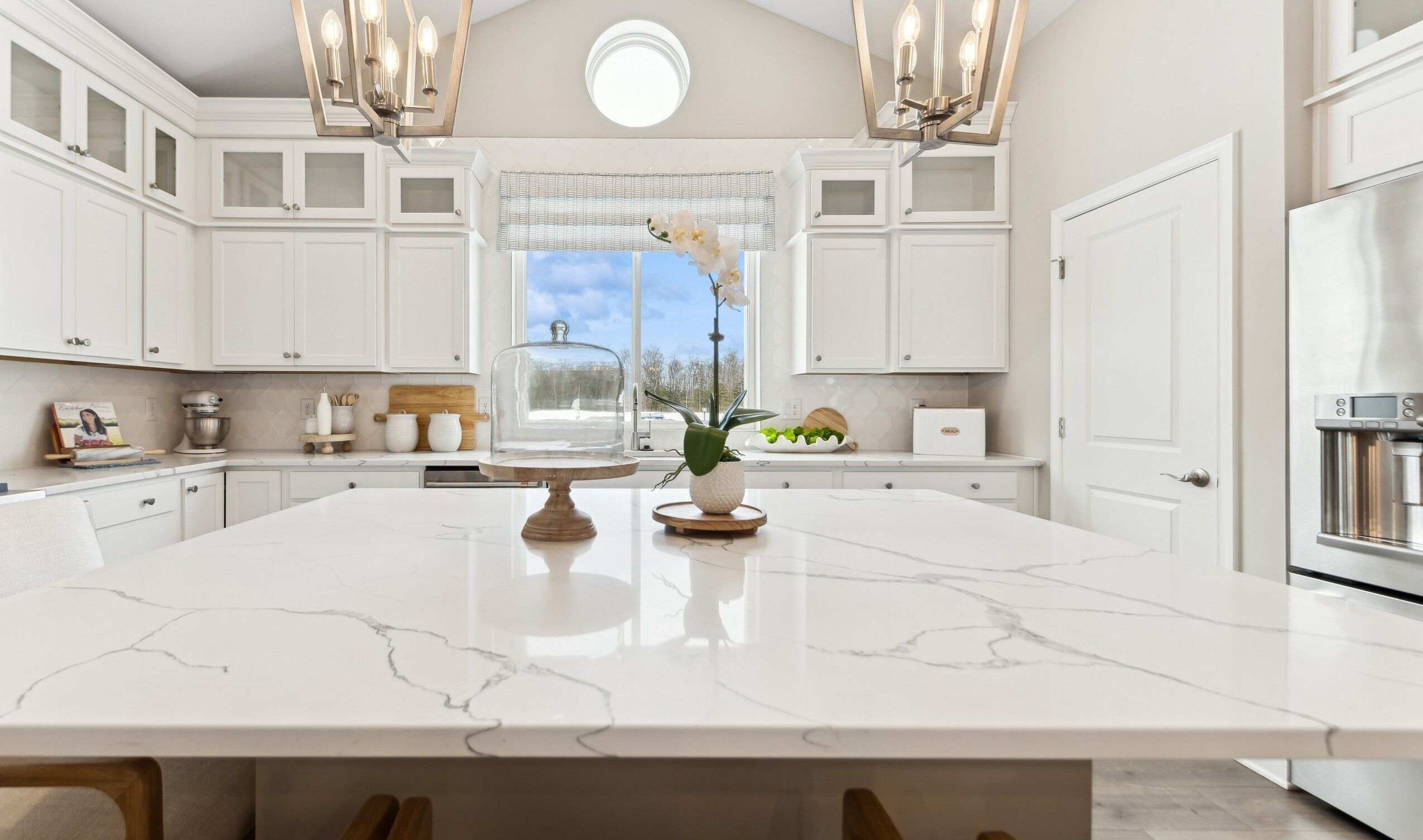 Kitchen with glass upper cabinets