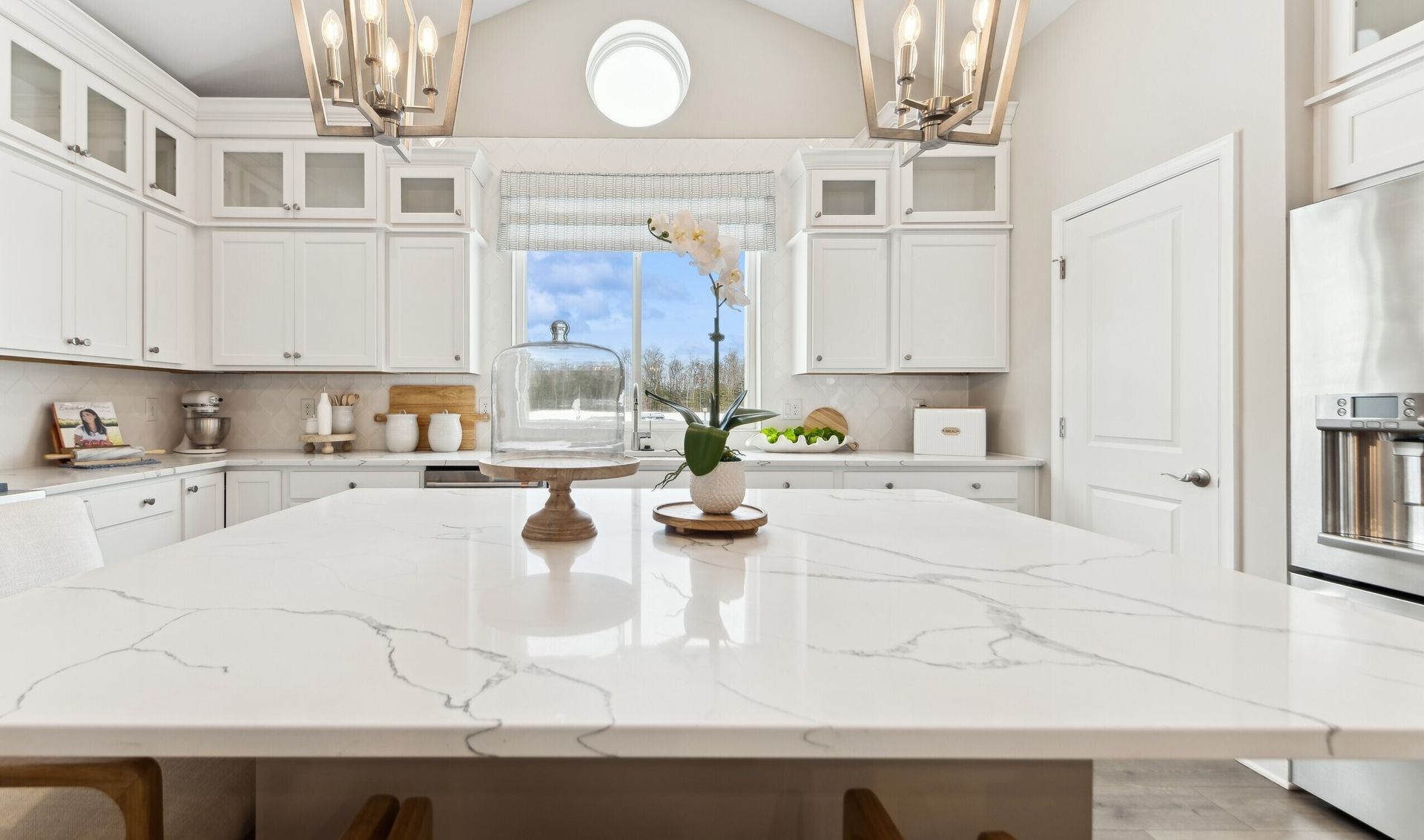 Kitchen with glass upper cabinets
