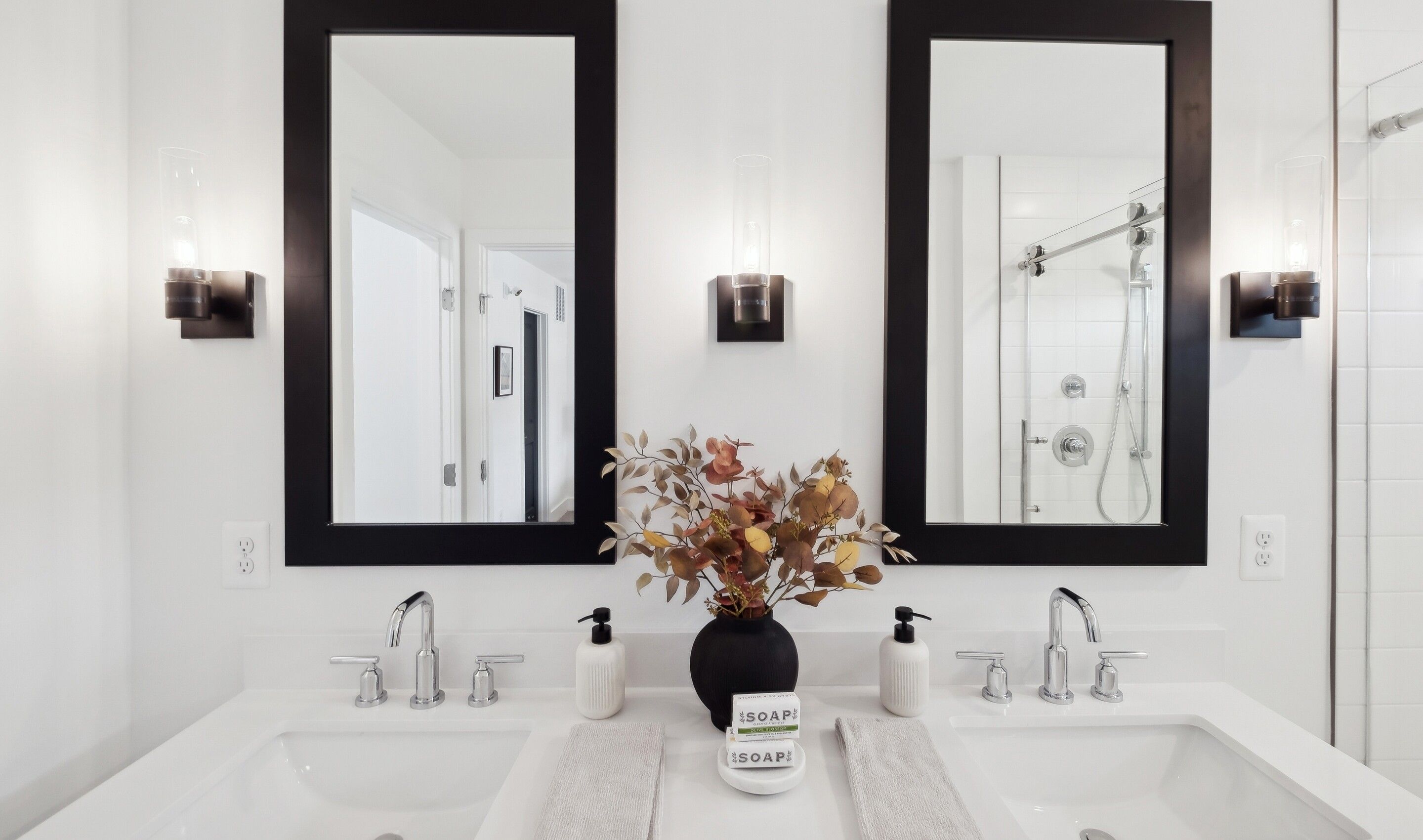 Primary bath with freestanding dual vanities