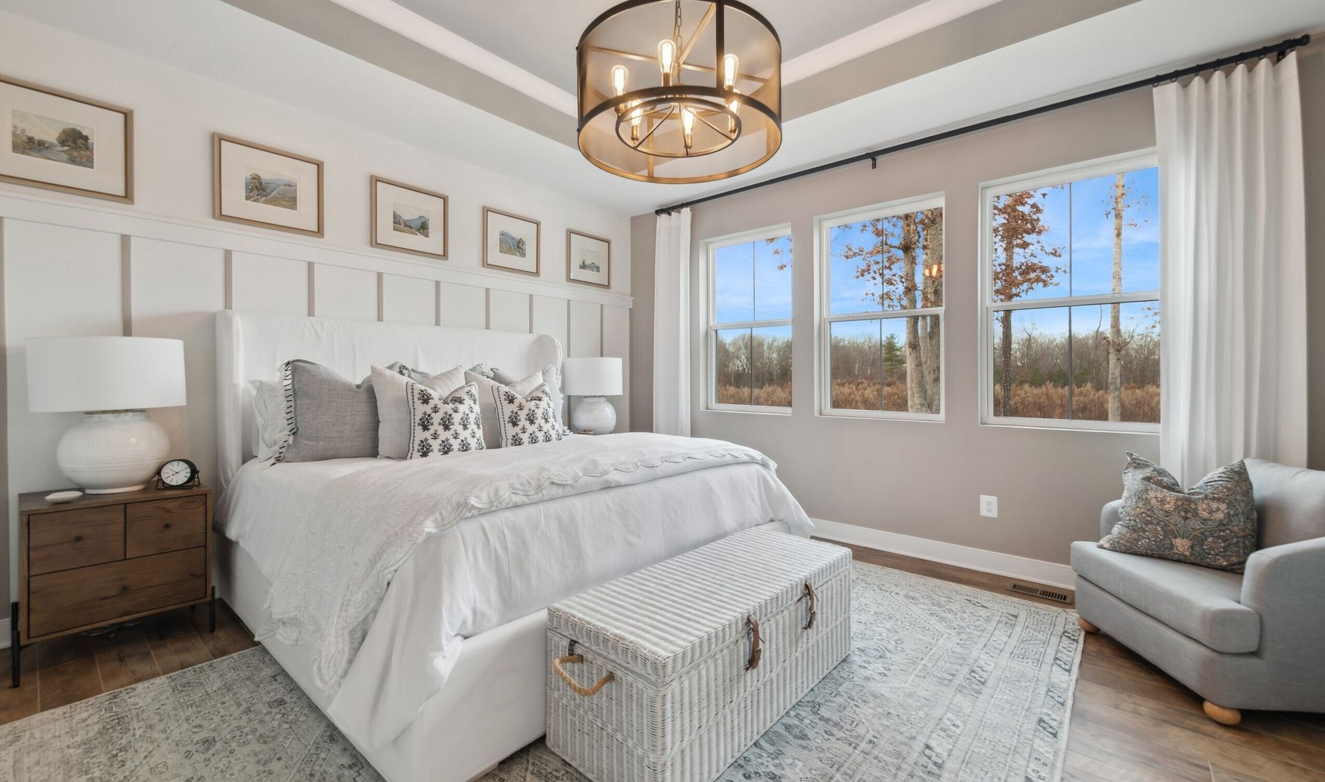 Primary suite with decorative feature wall