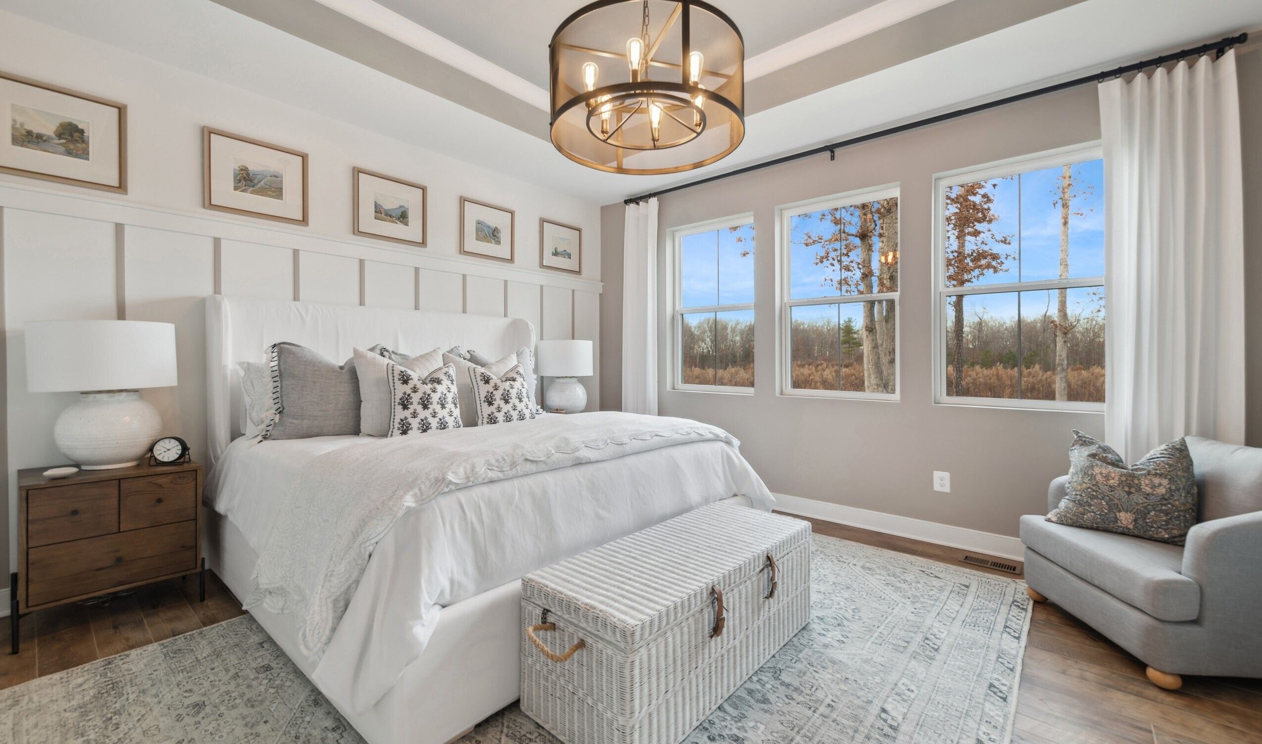 Primary suite with decorative feature wall