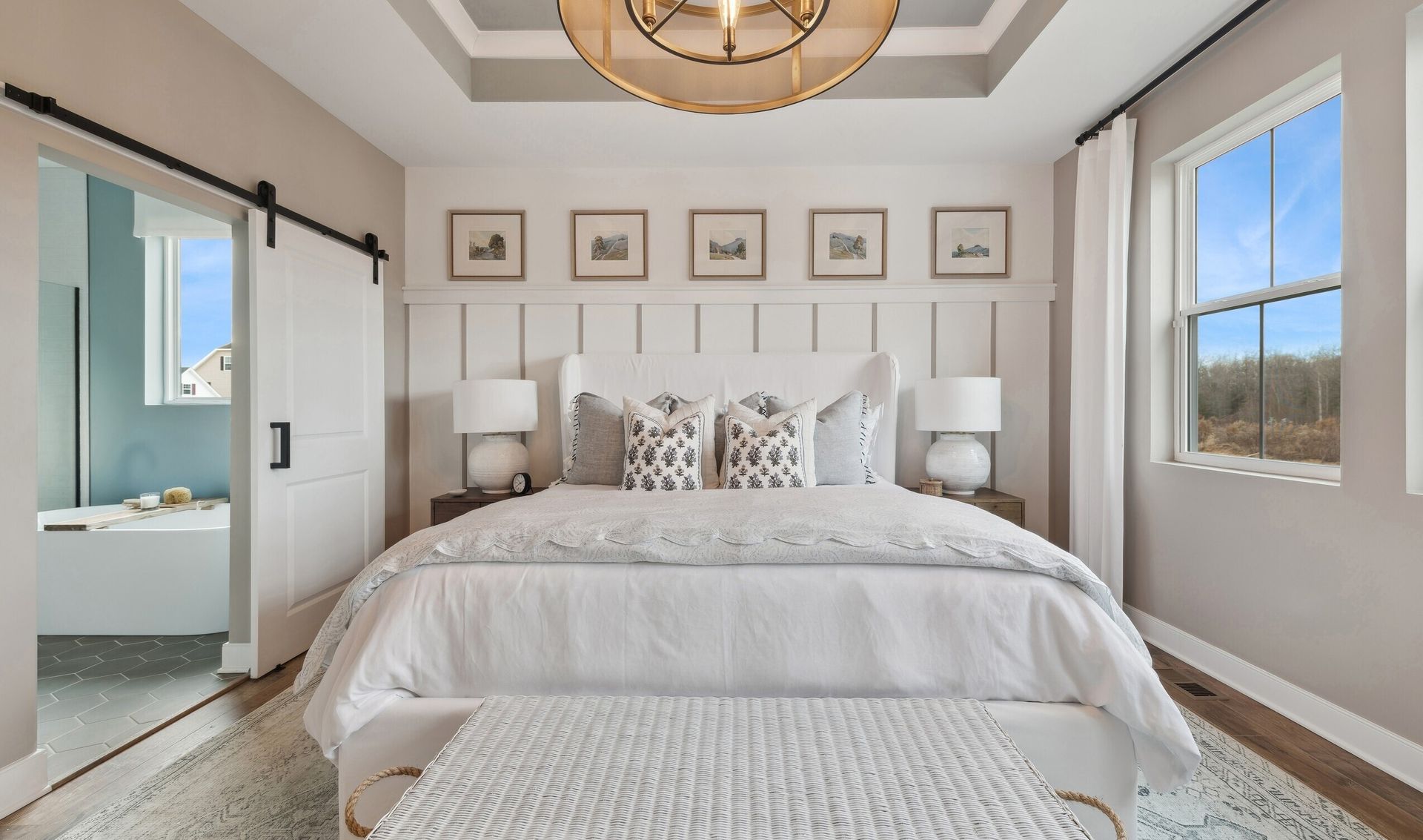 Primary suite with decorative feature wall
