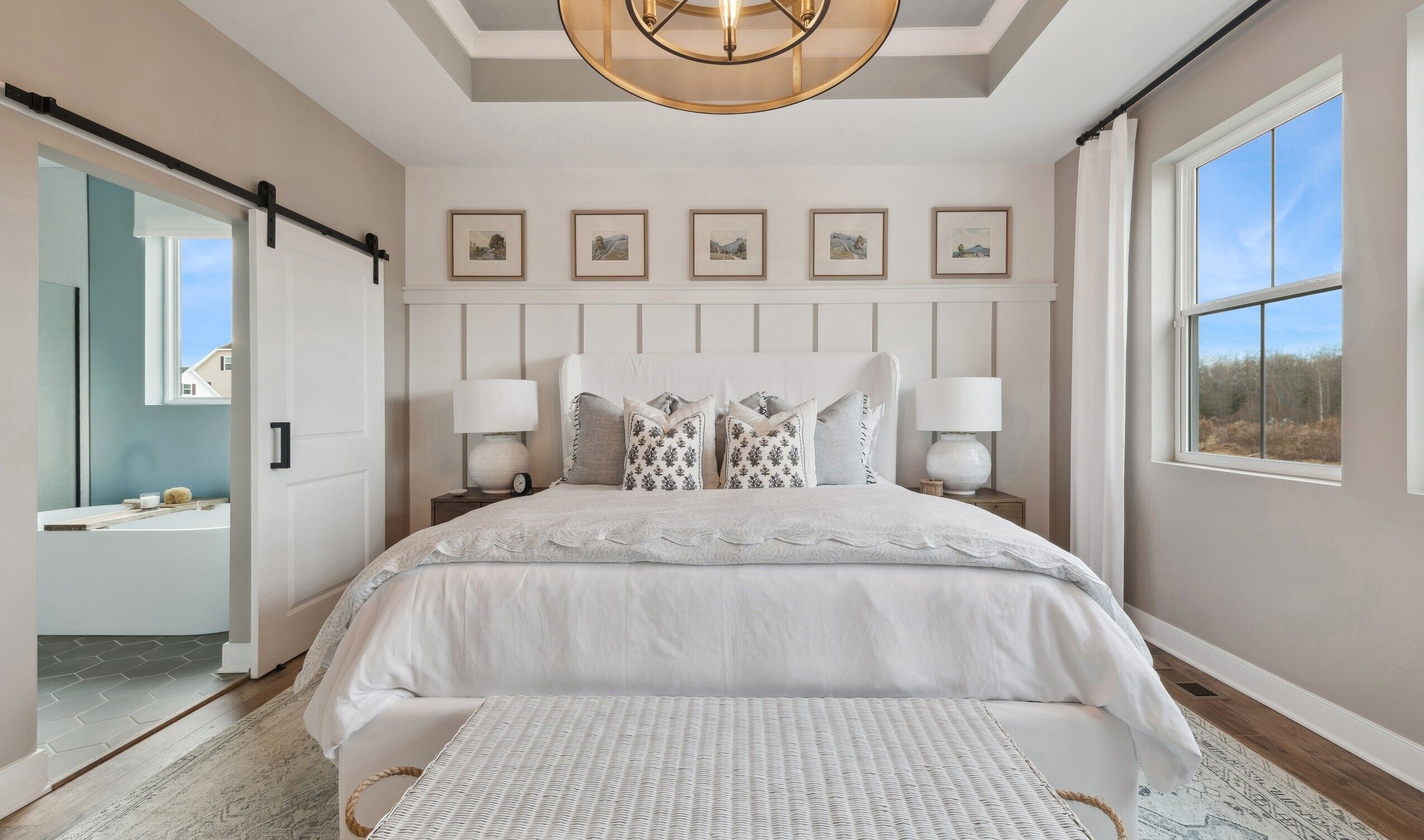 Primary suite with decorative feature wall