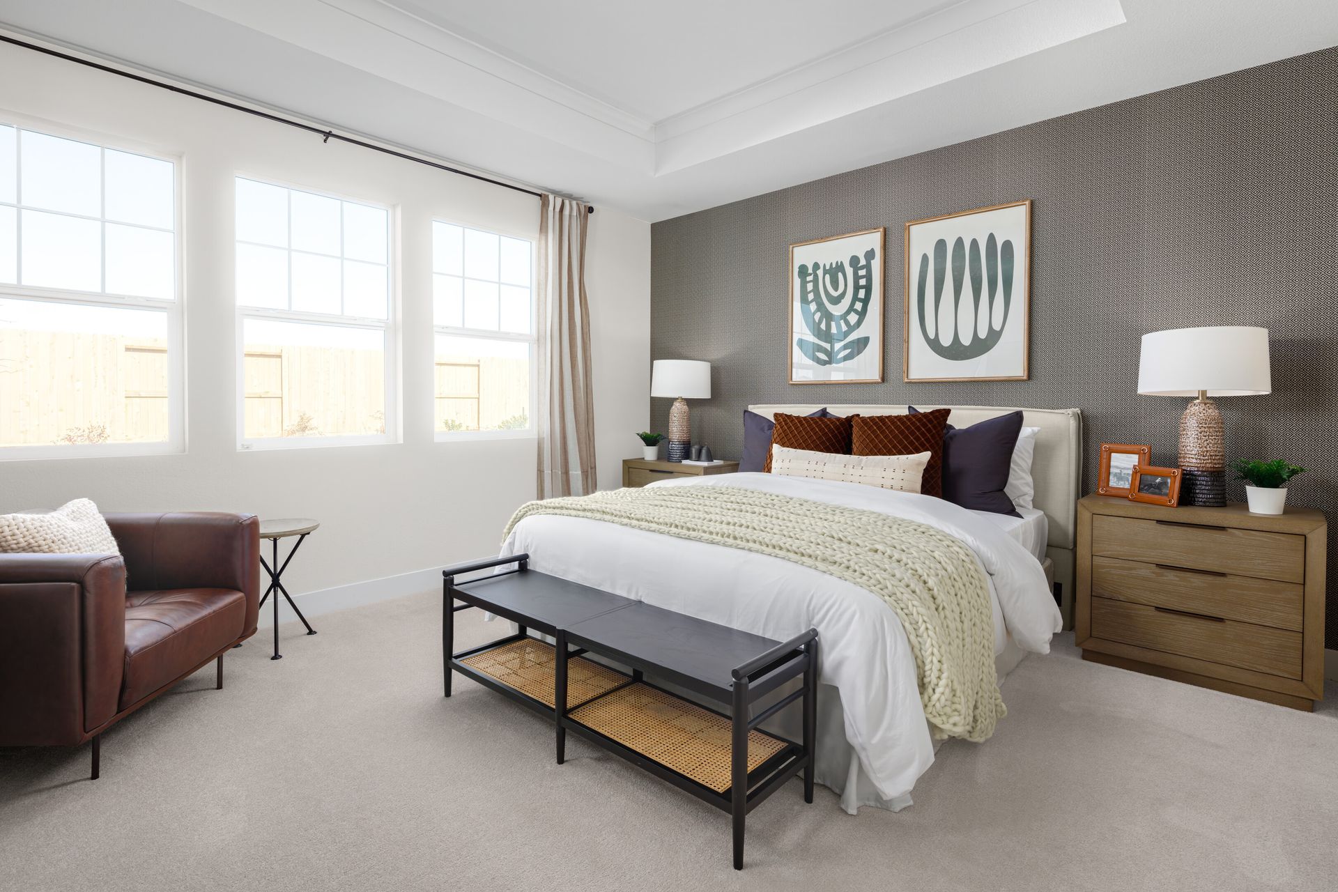 Primary suite with tray ceiling and crown moulding
