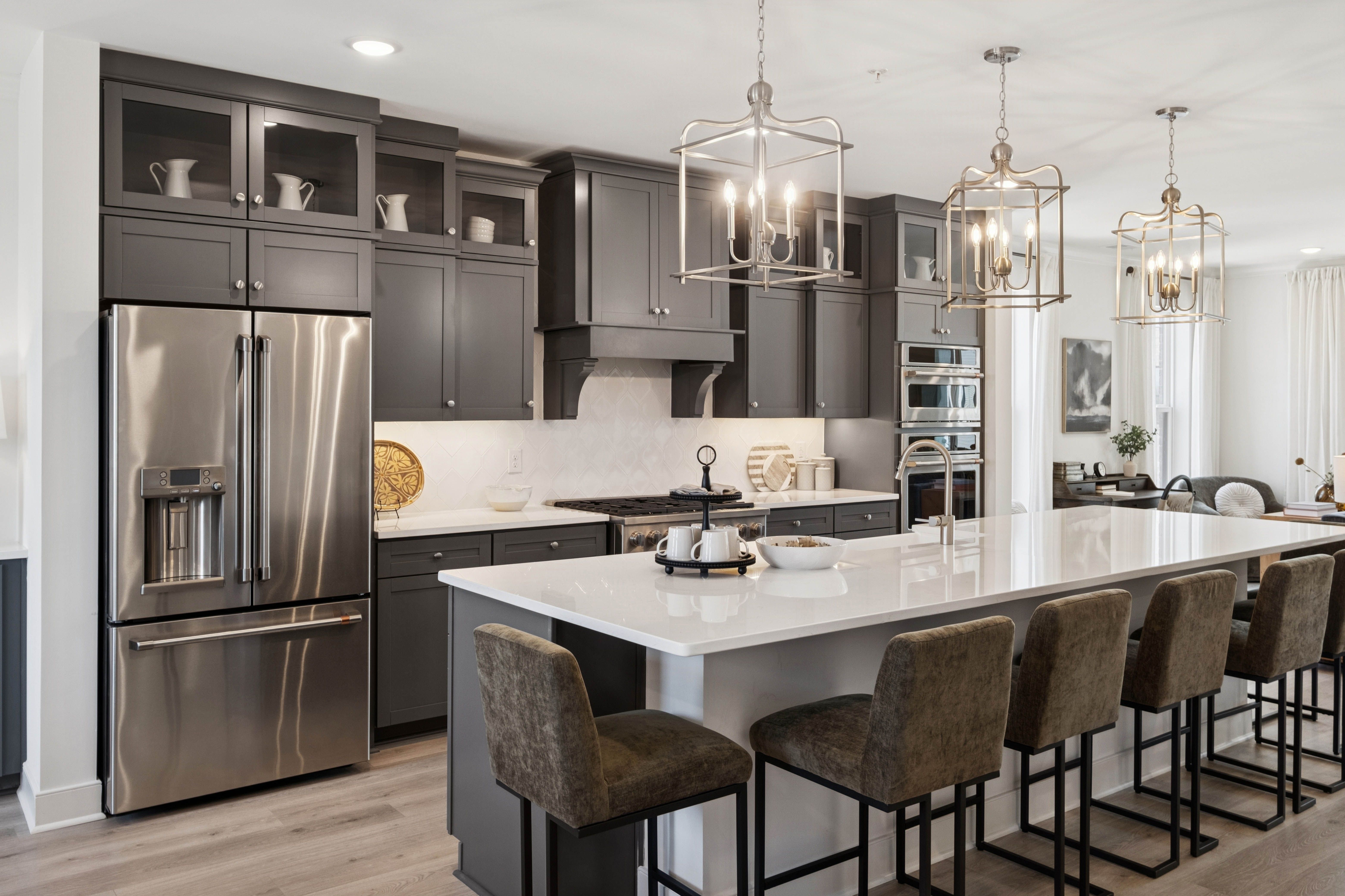 Kitchen with quartz countertops and glass-upper cabinets