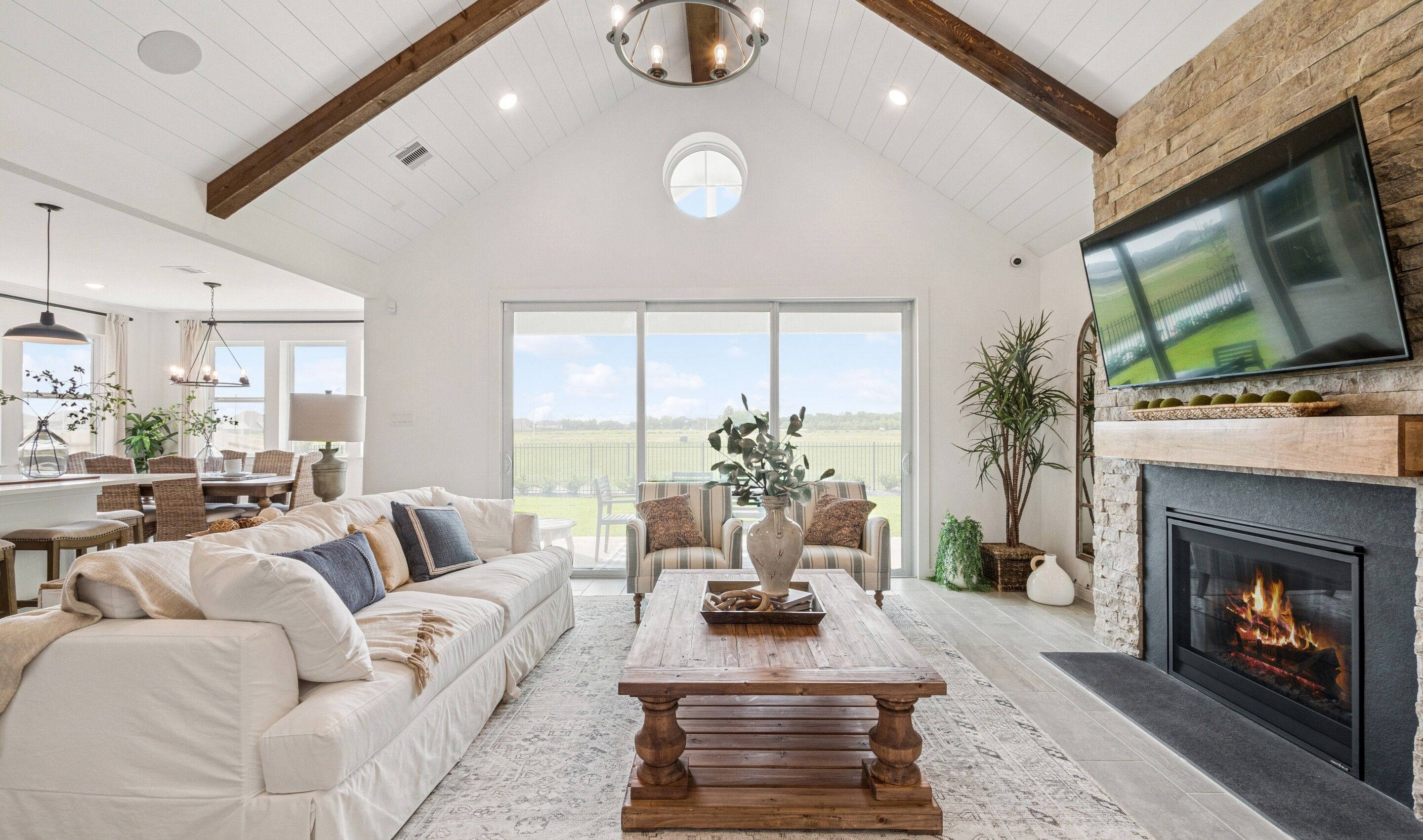Great room with 12' multi-slide door to covered patio