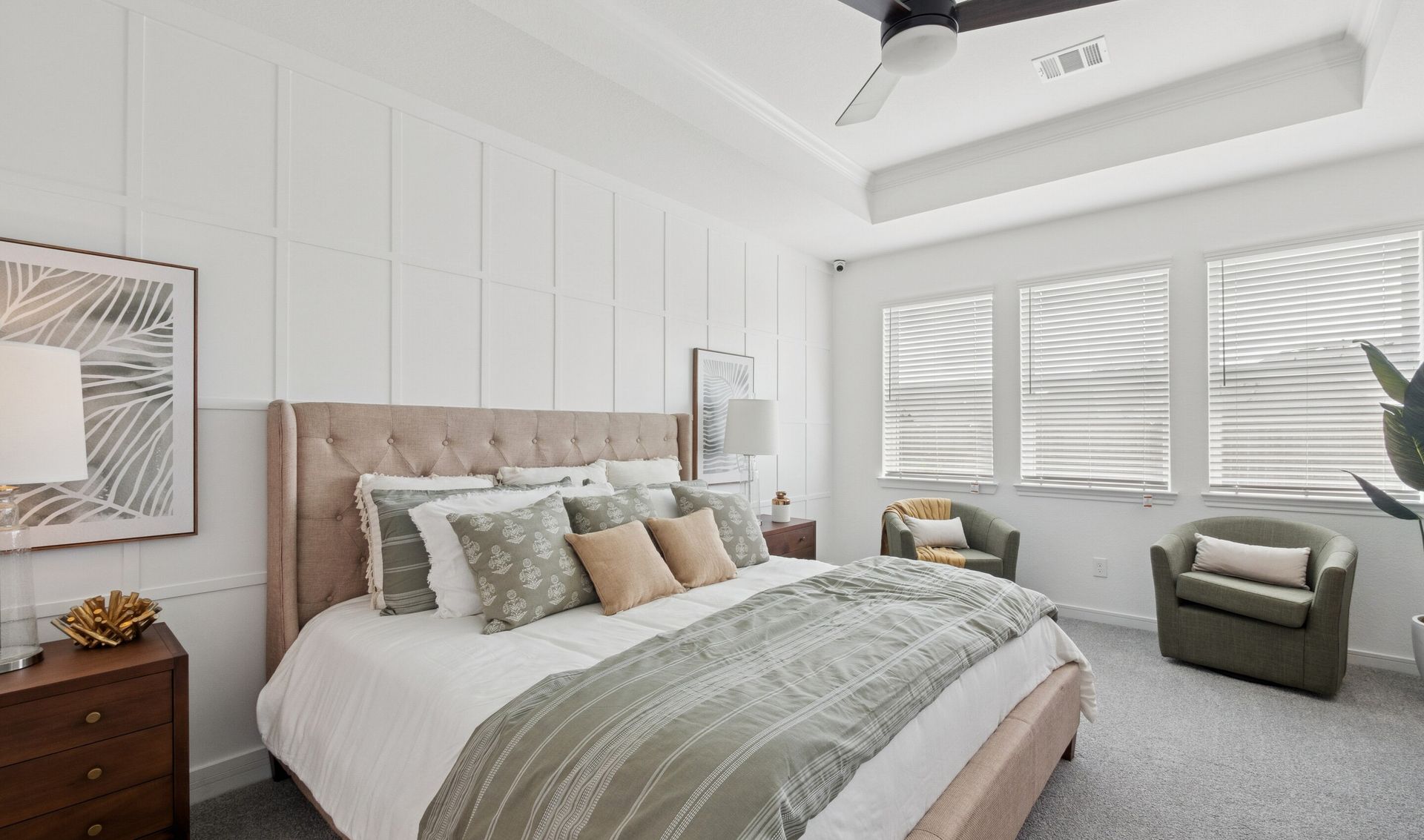 Primary suite with decorative feature wall
