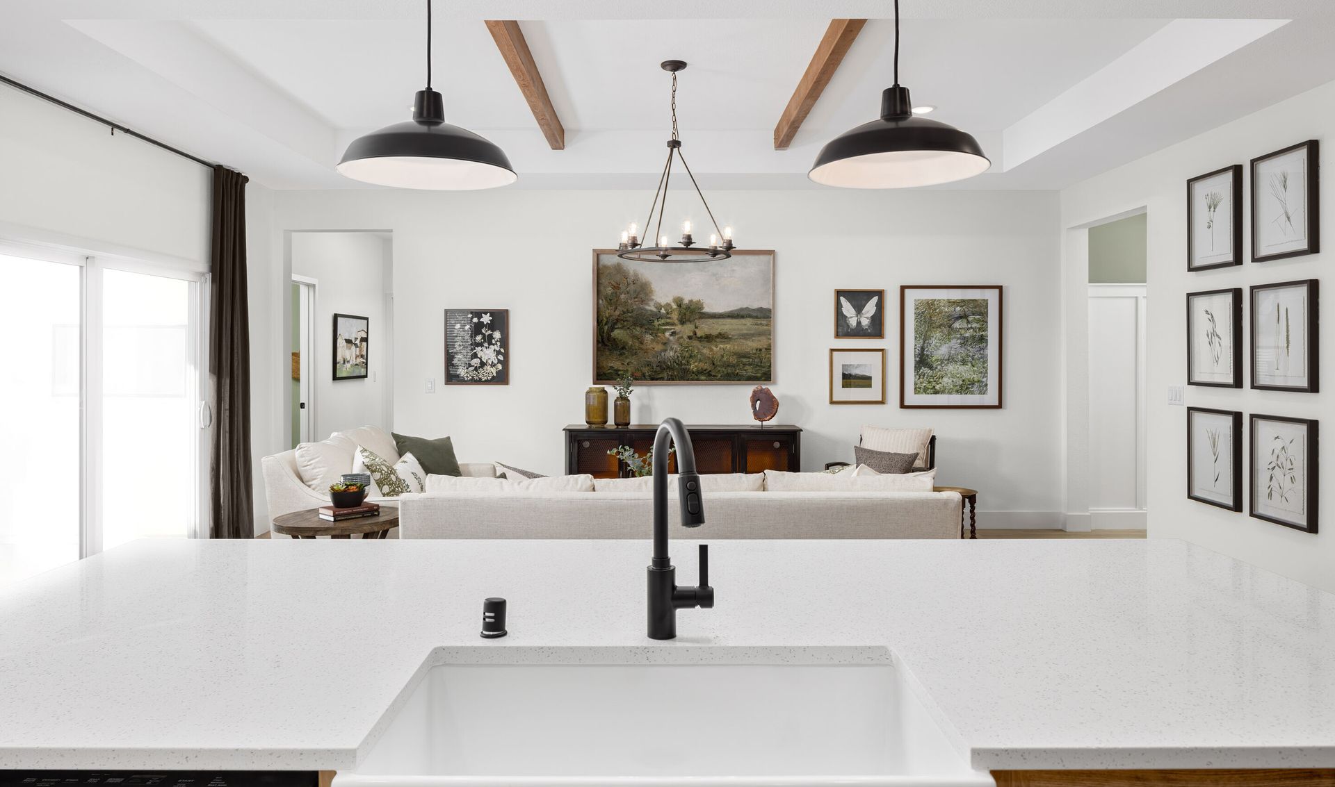 Kitchen with pendant lighting and white apron-front sink