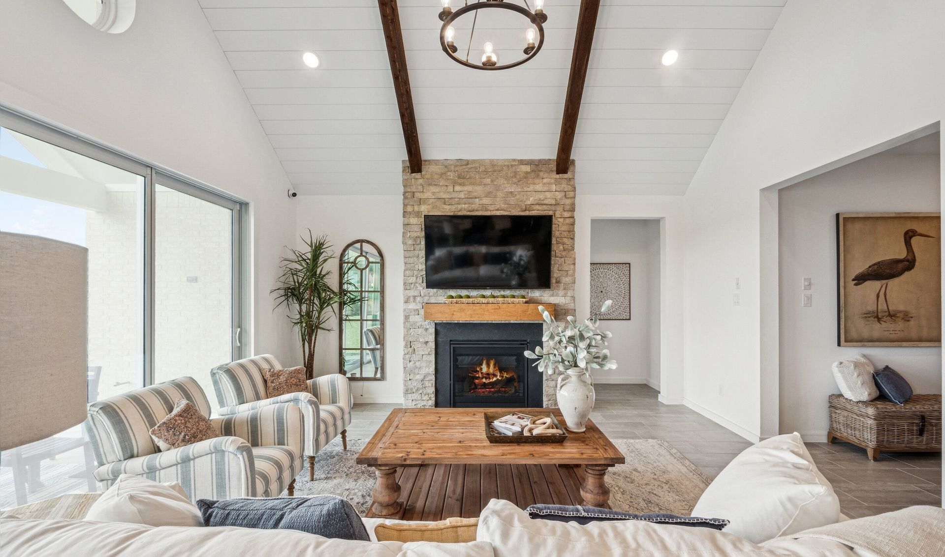 Great room with stained ceiling beams