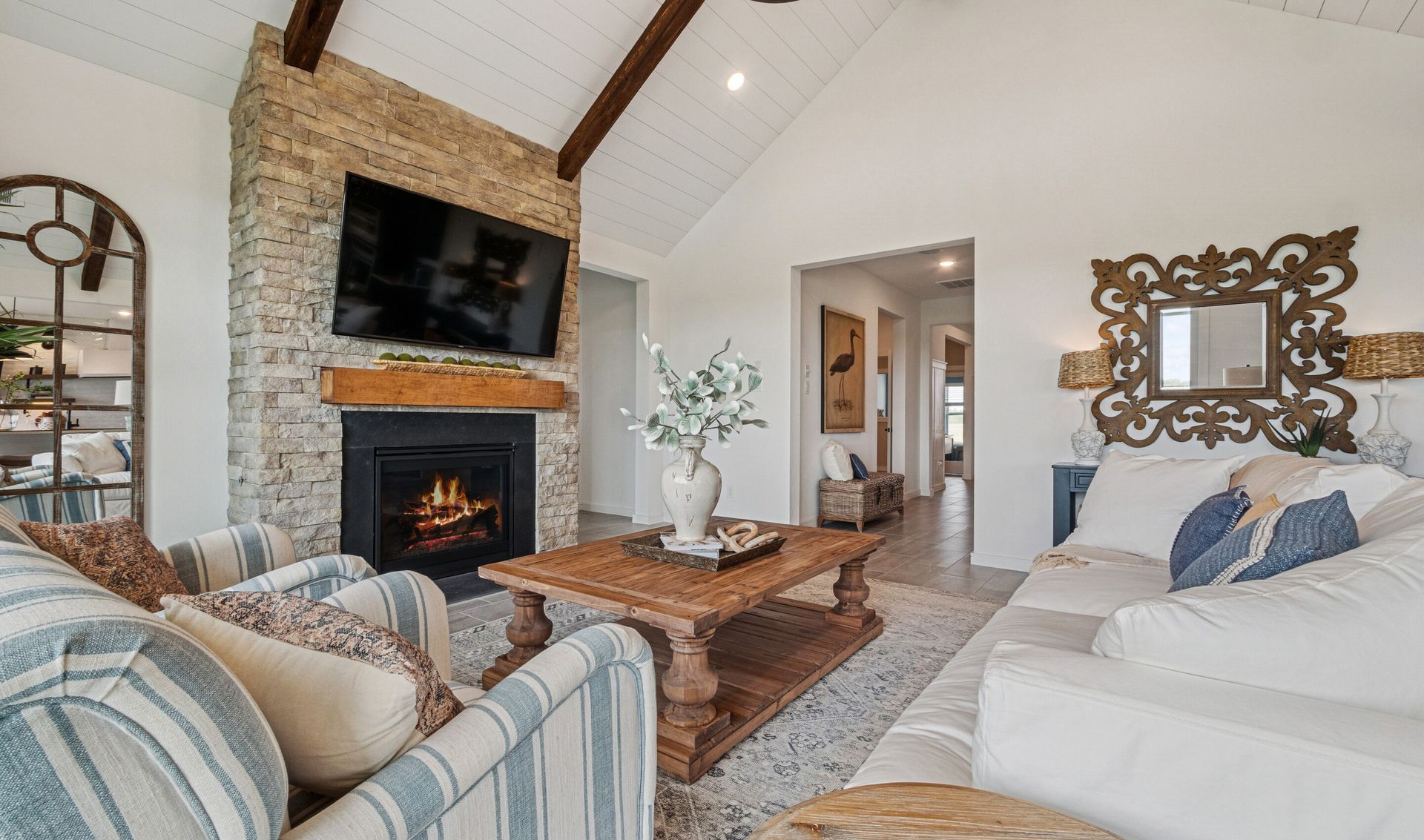 Great room with shiplap ceiling treatment