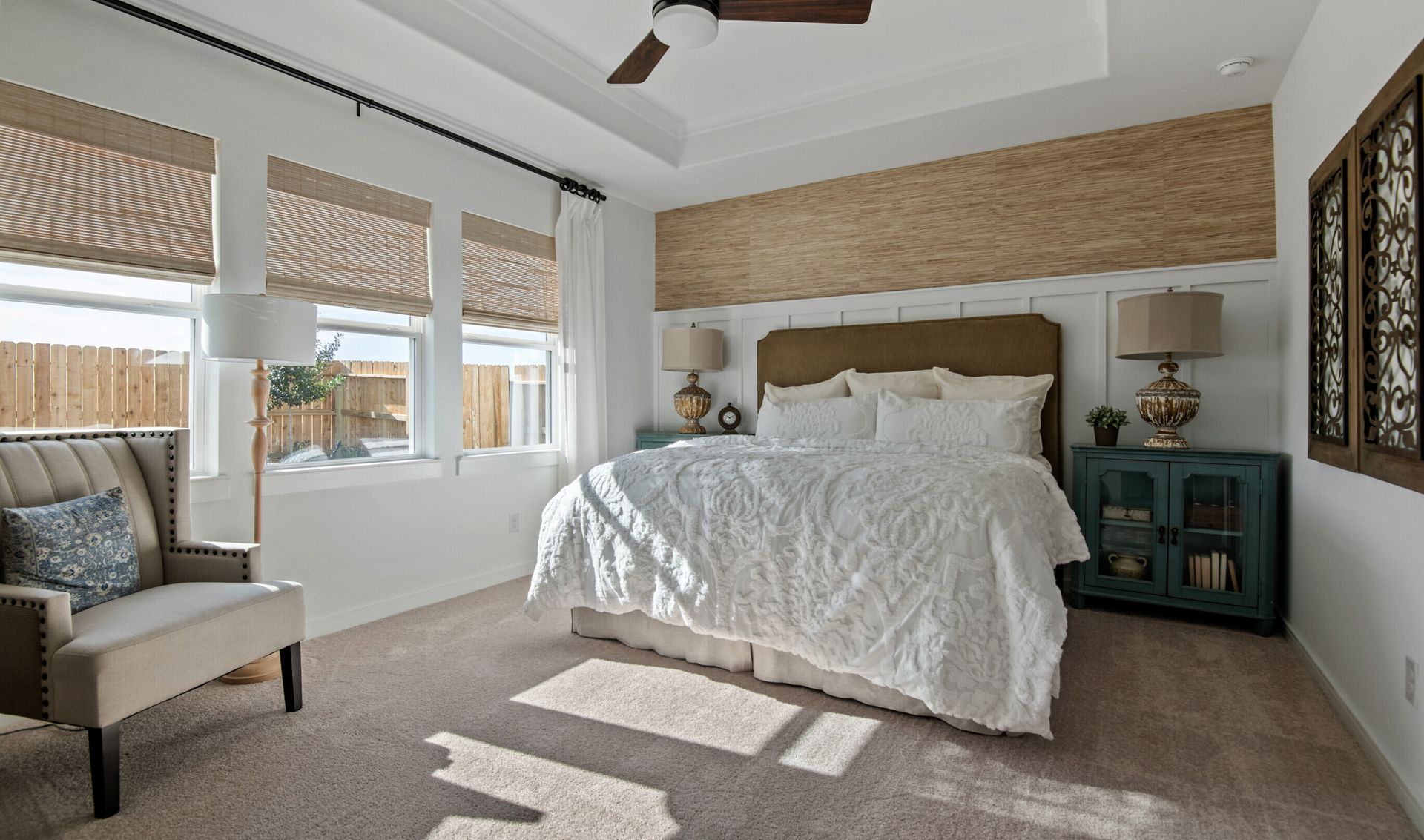 Primary suite with decorative feature wall