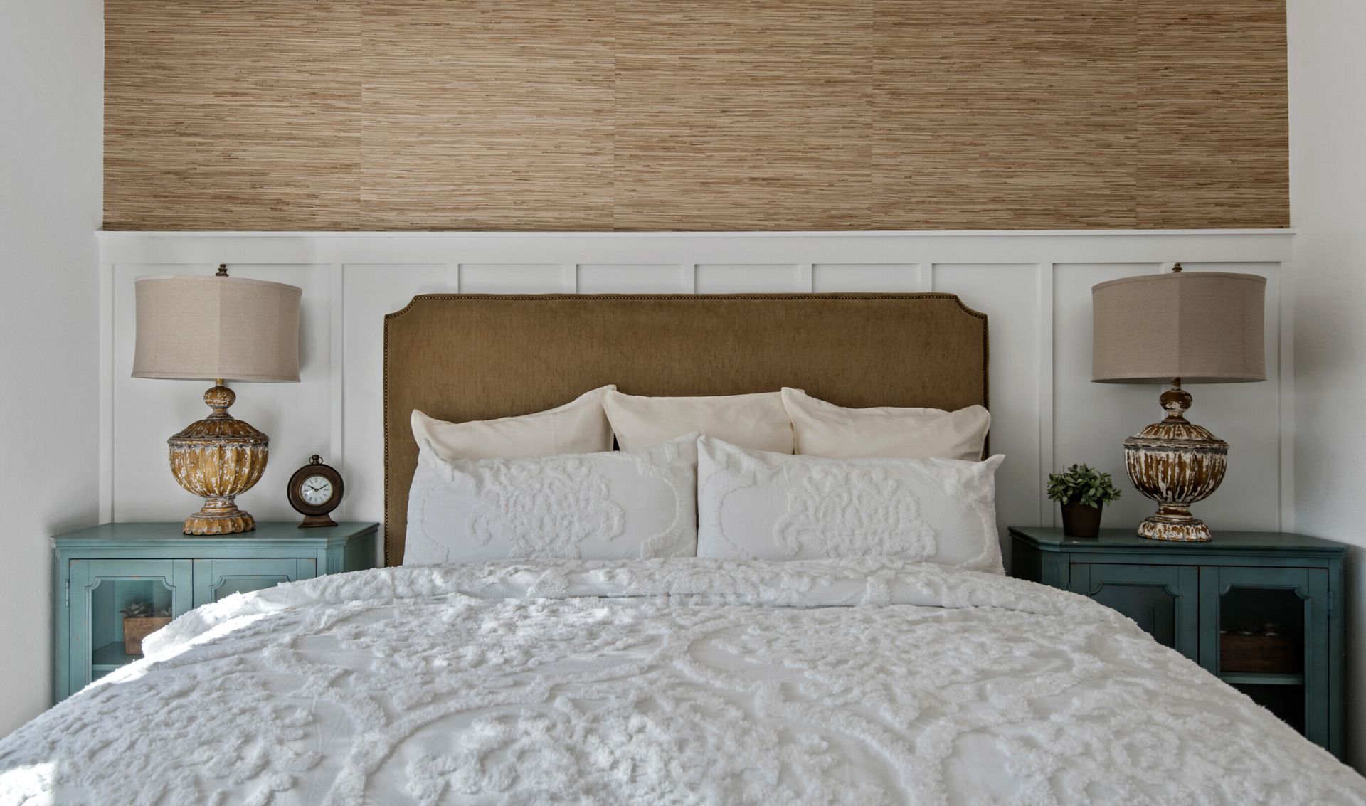 Primary suite with decorative feature wall