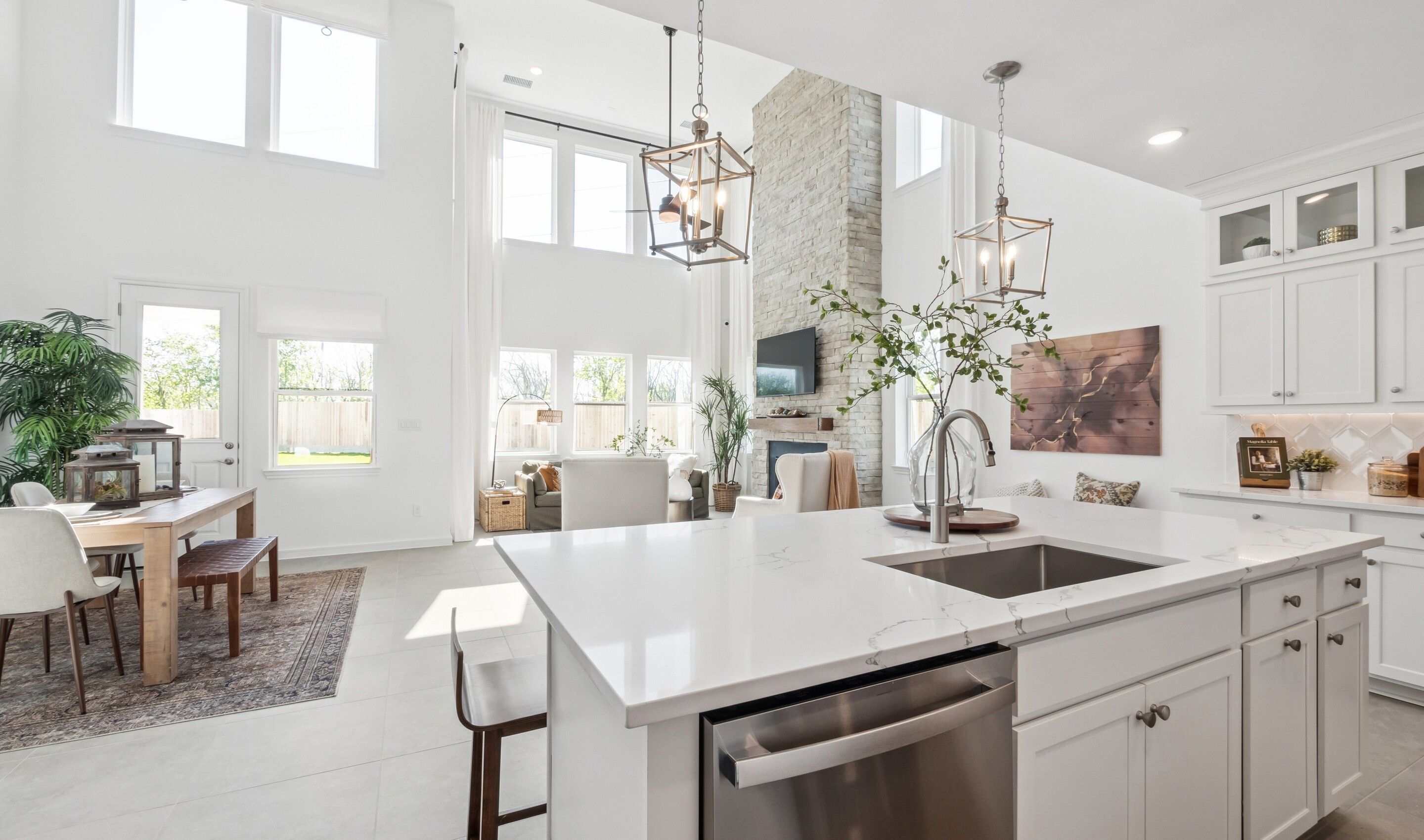 Spacious kitchen island overlooking dining area & great room