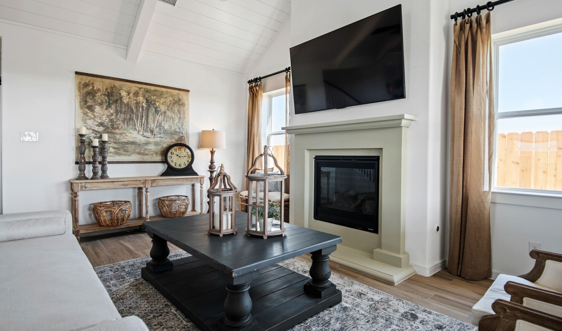 Great room with vaulted ceiling and fireplace