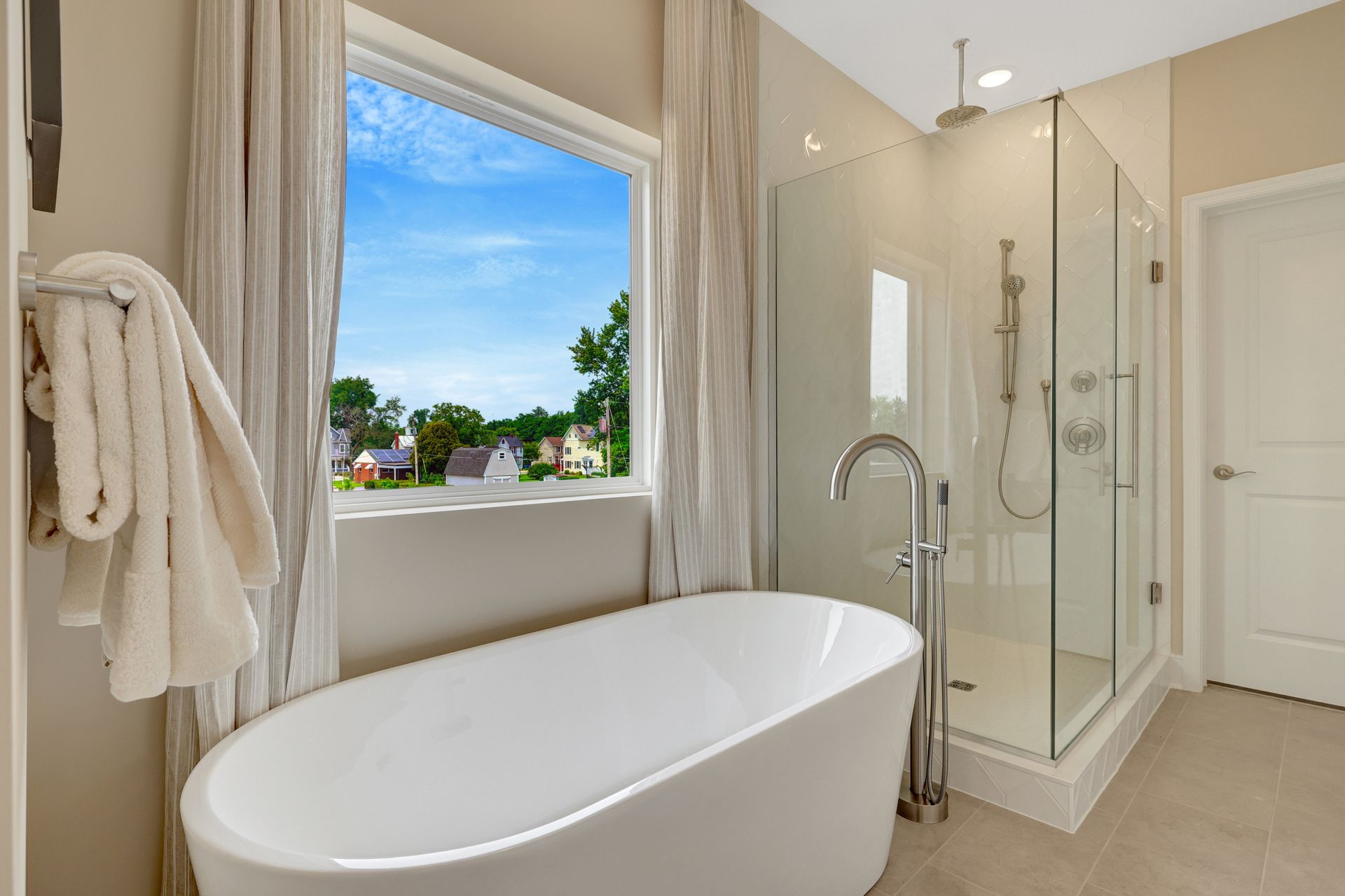 Primary bath with glass shower enclosure